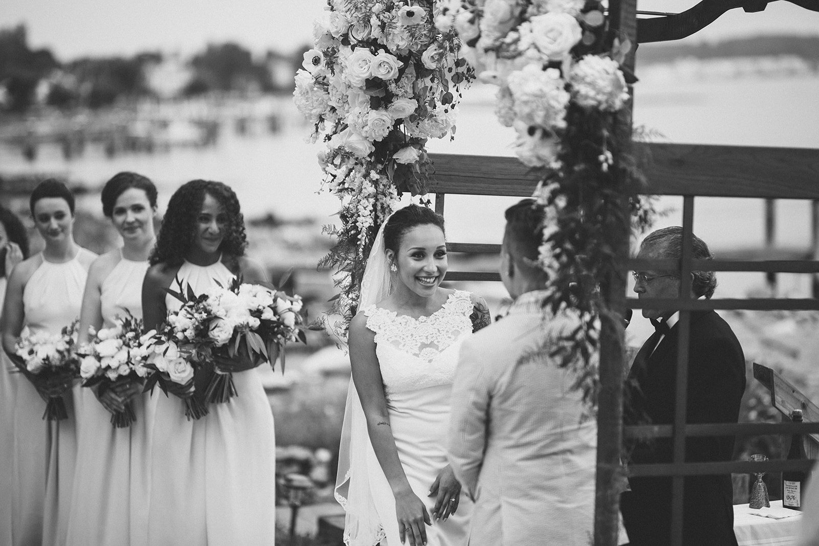 Couple getting married next to bridesmaids in Annapolis MD Shawnee Custalow Photographer