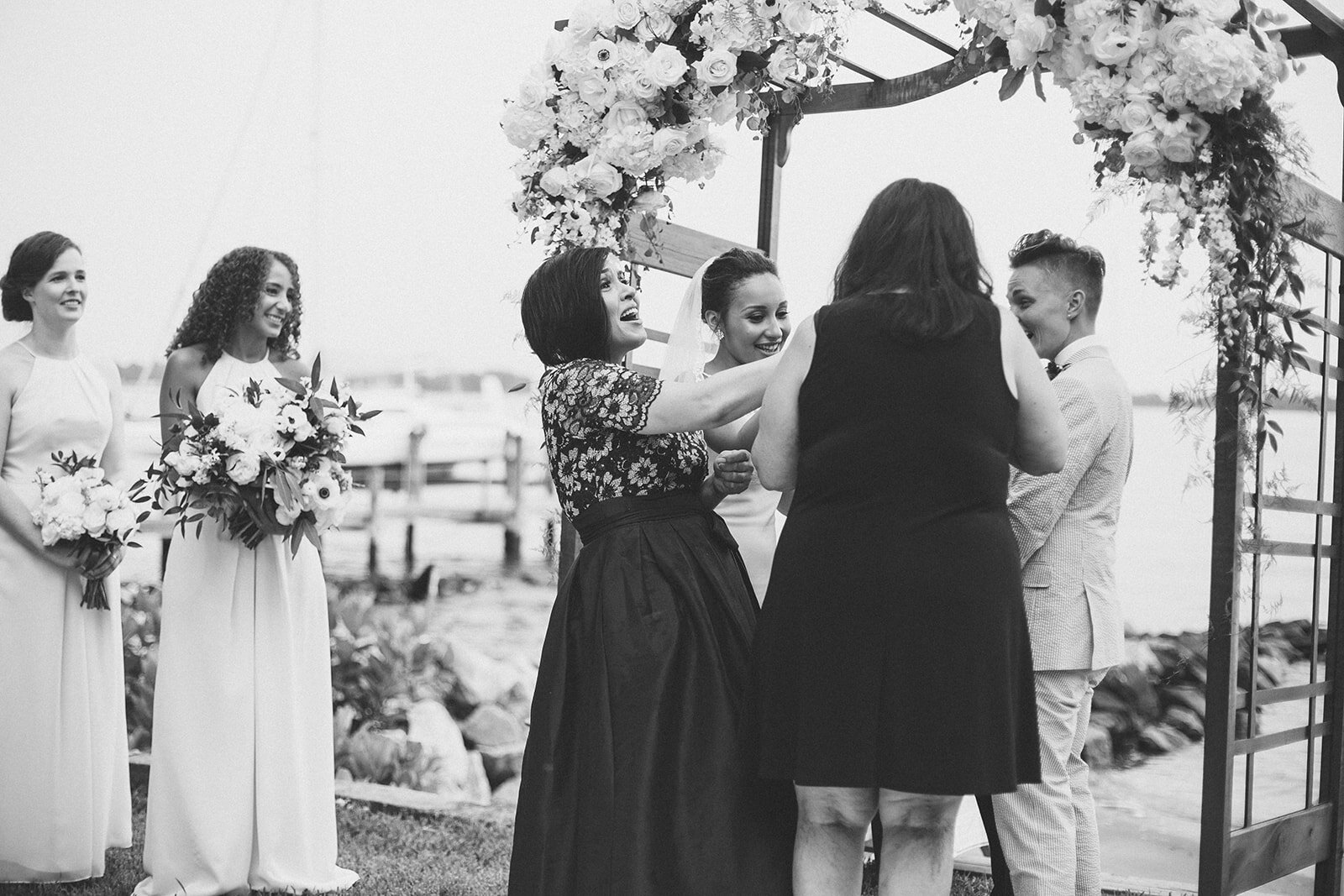 Guests help wedding ceremony in Annapolis MD Shawnee Custalow Queer Wedding Photographer