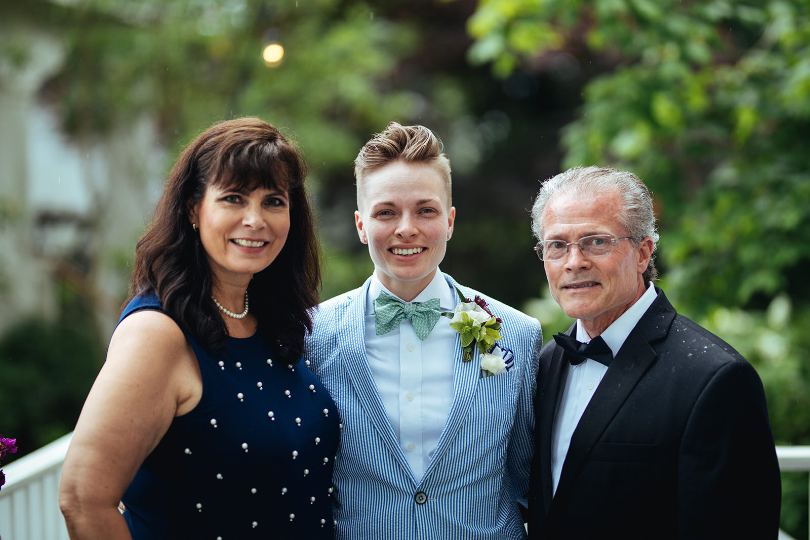 Newlywed spouse with Parents in Annapolis MD Shawnee Custalow Queer Wedding Photography