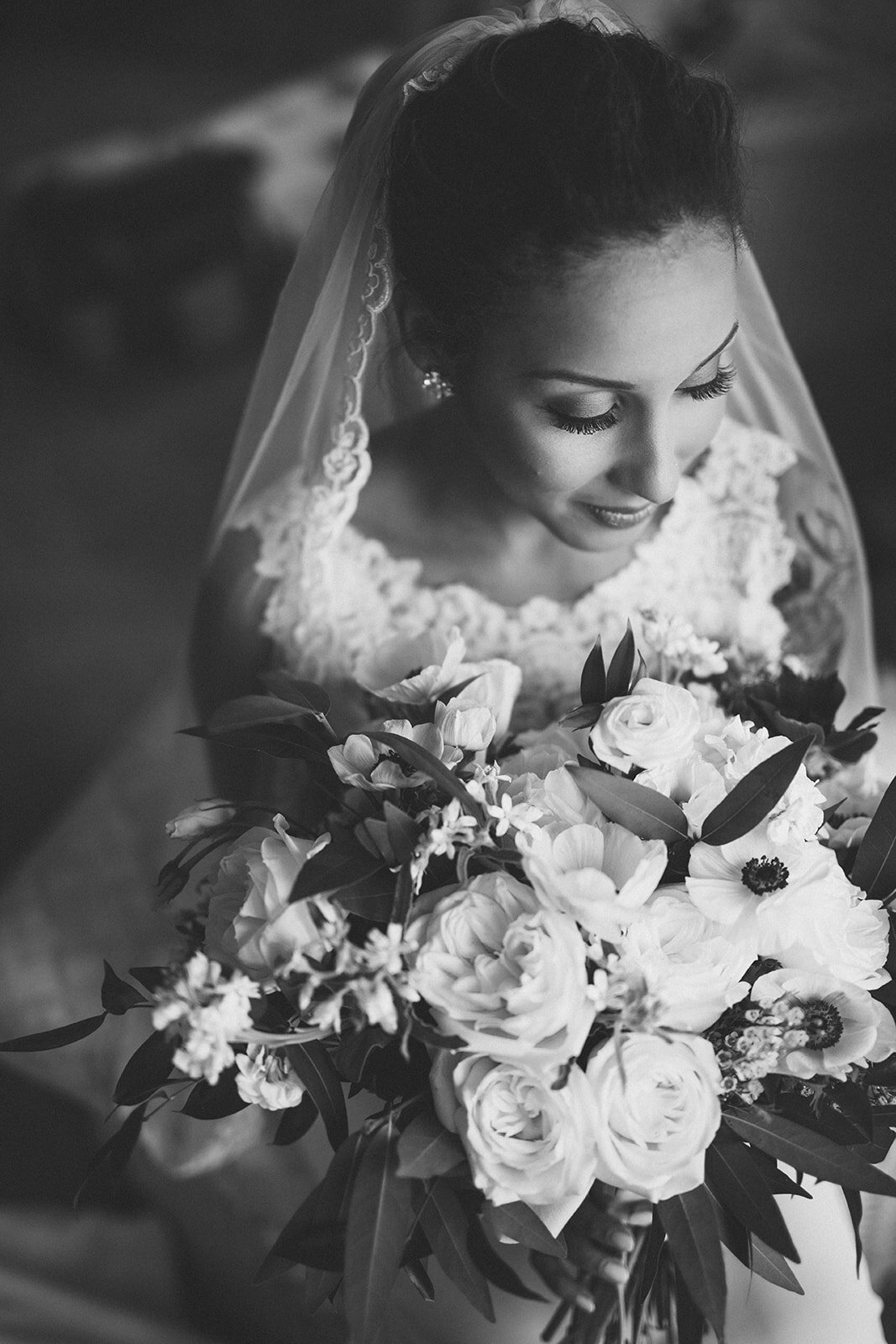 Newlywed bride with bouquet in Annapolis MD Shawnee Custalow Queer Wedding Photography