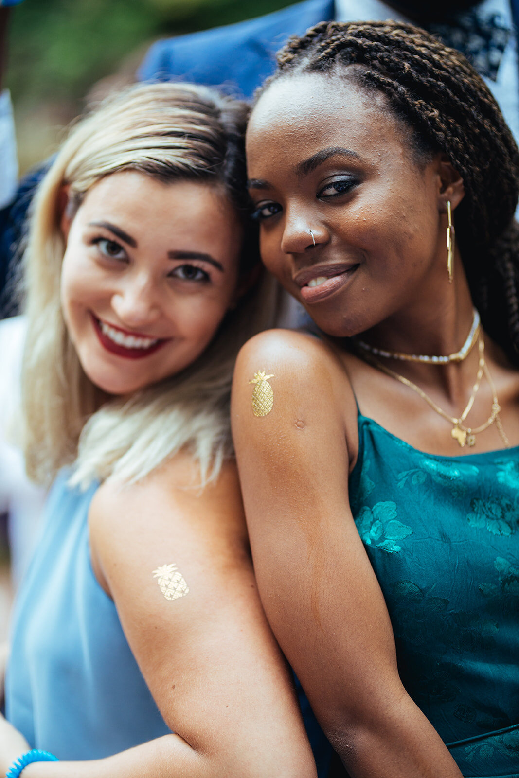 Wedding guests with gold temporary tattoos in Annapolis MD Shawnee Custalow Photography