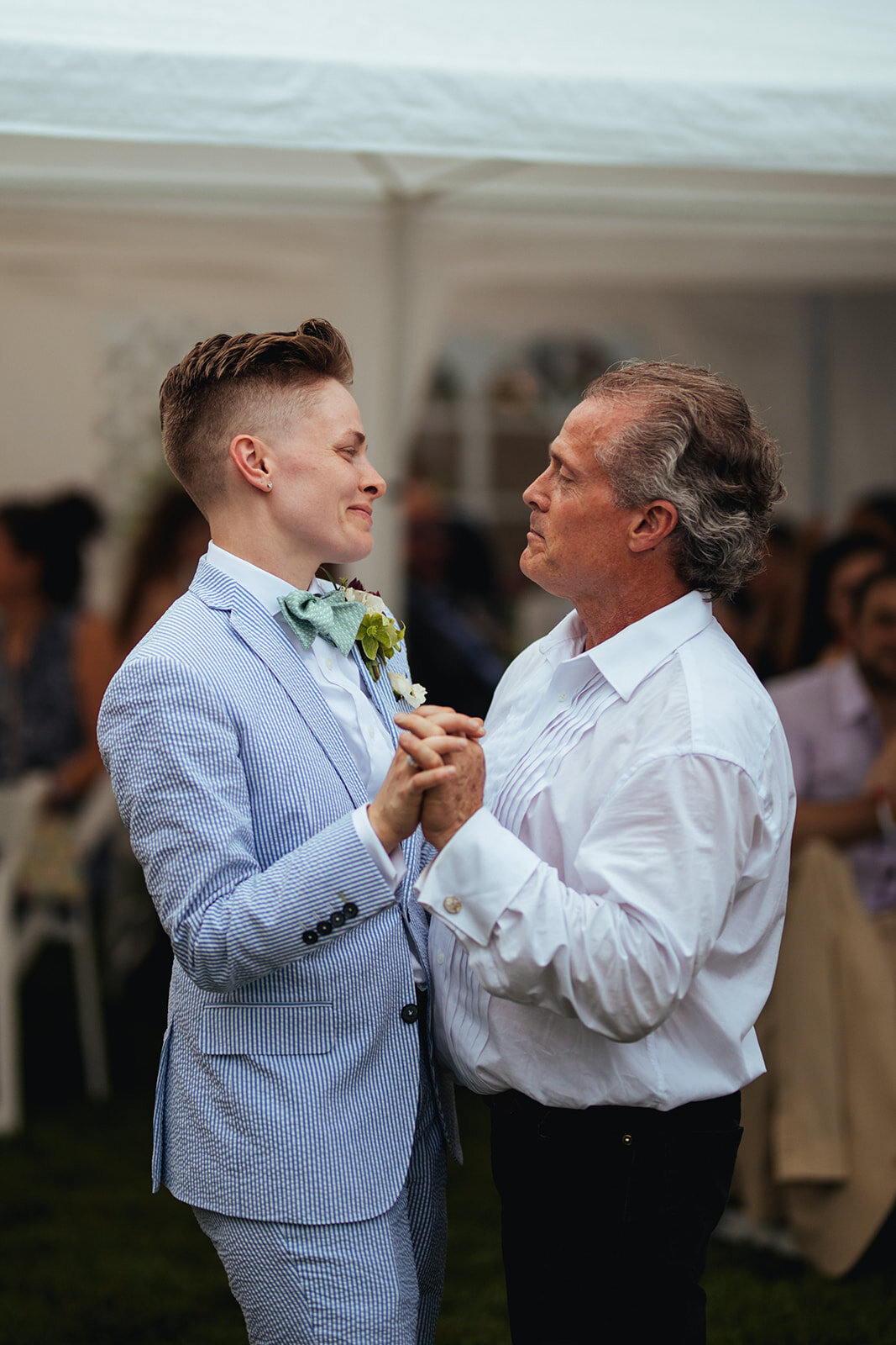 Newlywed dancing with father in Annapolis MD Shawnee Custalow Queer Wedding Photography