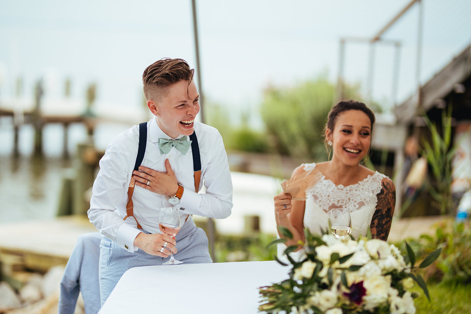 Newlyweds laughing at Annapolis wedding reception MD Shawnee Custalow Photography