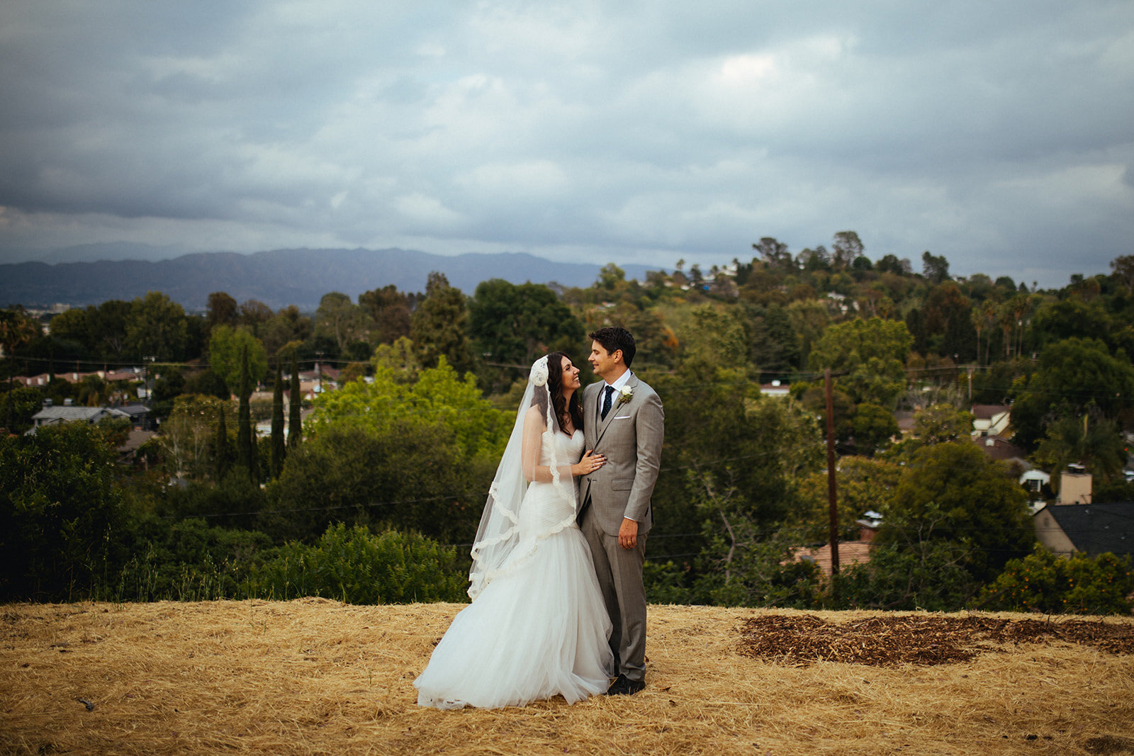 Newlywed couple smiling together in Los Angeles Shawnee Custalow Queer Wedding Photography