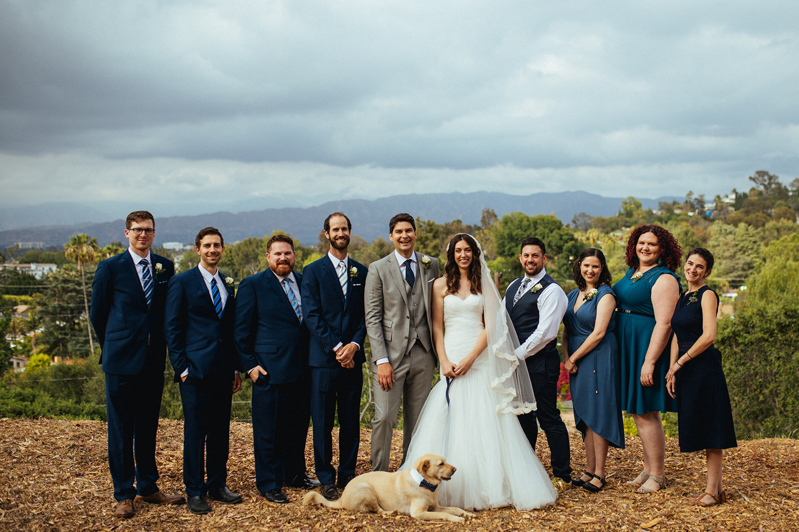 Newlyweds posing with wedding party and pet dog in Studio City LA Shawnee Custalow Wedding Photography