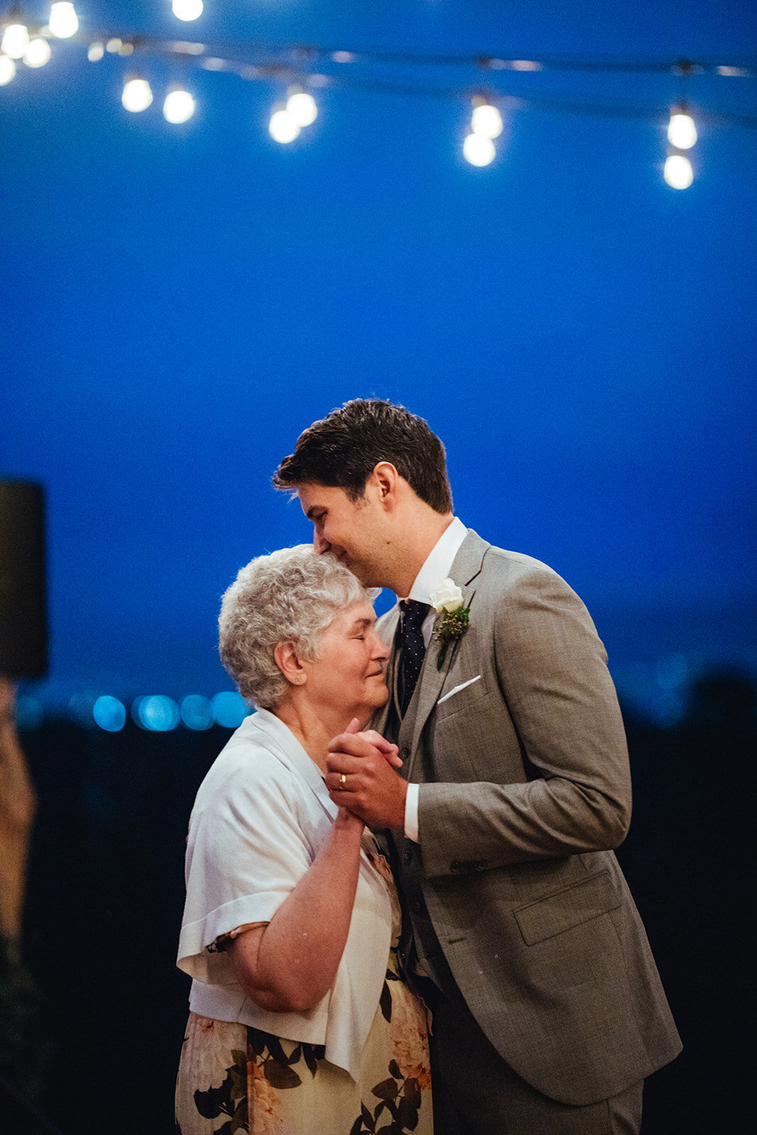 Groom dancing with his mother at wedding reception in LA Shawnee Custalow Queer Photography