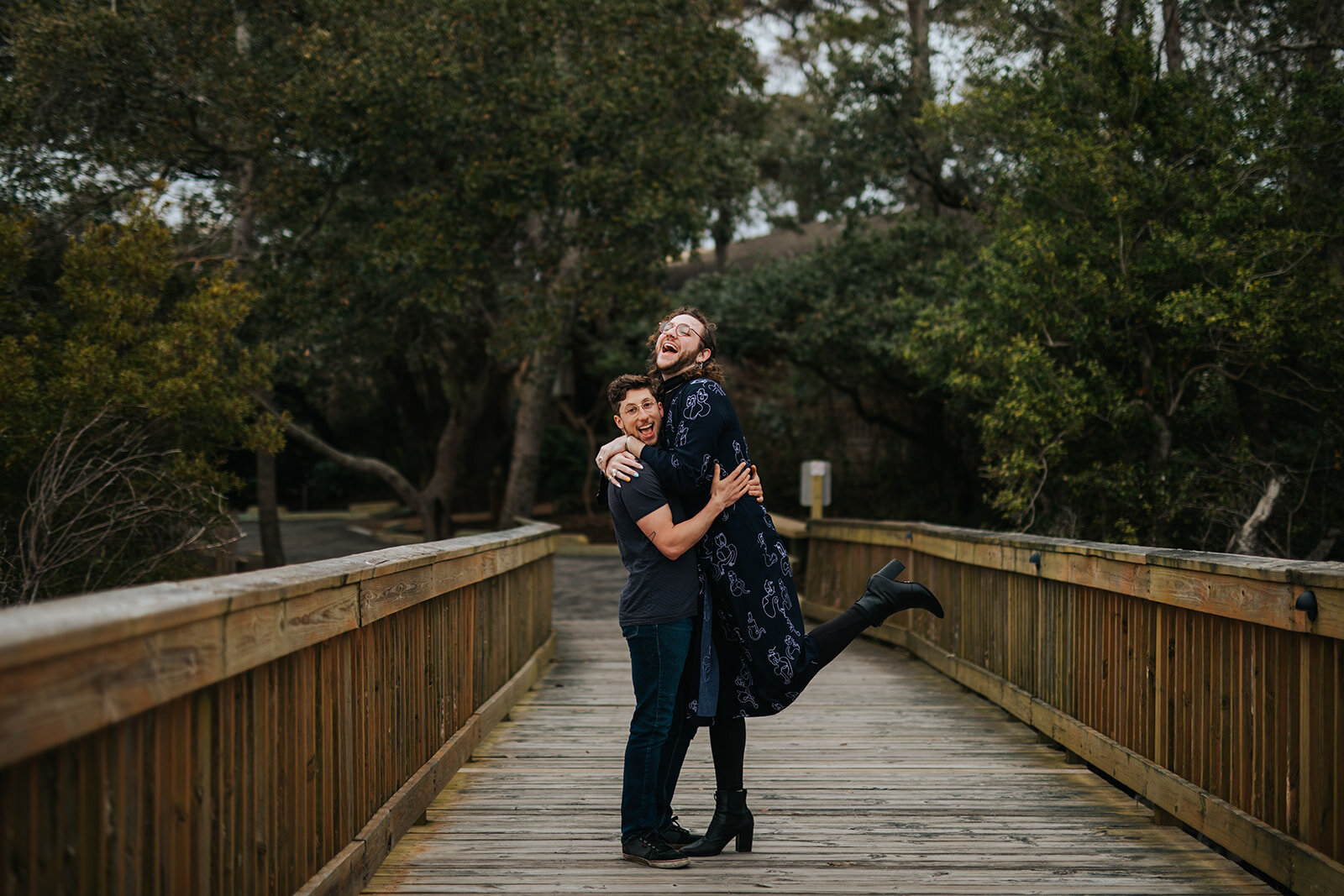Queer couple embracing in Virginia Beach Shawnee Custalow photography