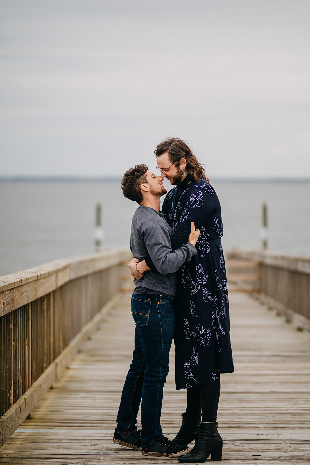 LGBTQ couple lean in for a kiss in VA Beach Shawnee Custalow photography