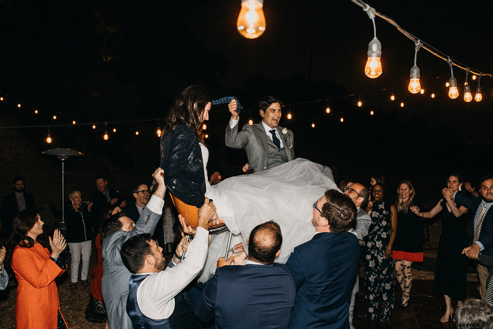 Bride and groom dancing the Hora with guests at reception LA Shawnee Custalow Queer Wedding Photography