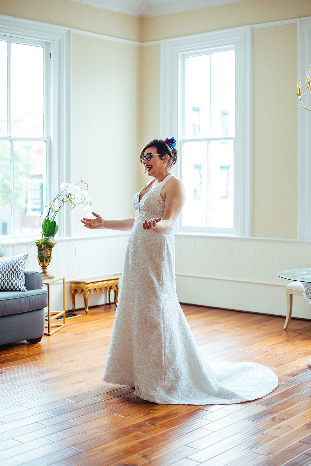 Bride excited to see her bride at Torpedo Factory Alexandria VA Shawnee Custalow Queer Wedding Photography