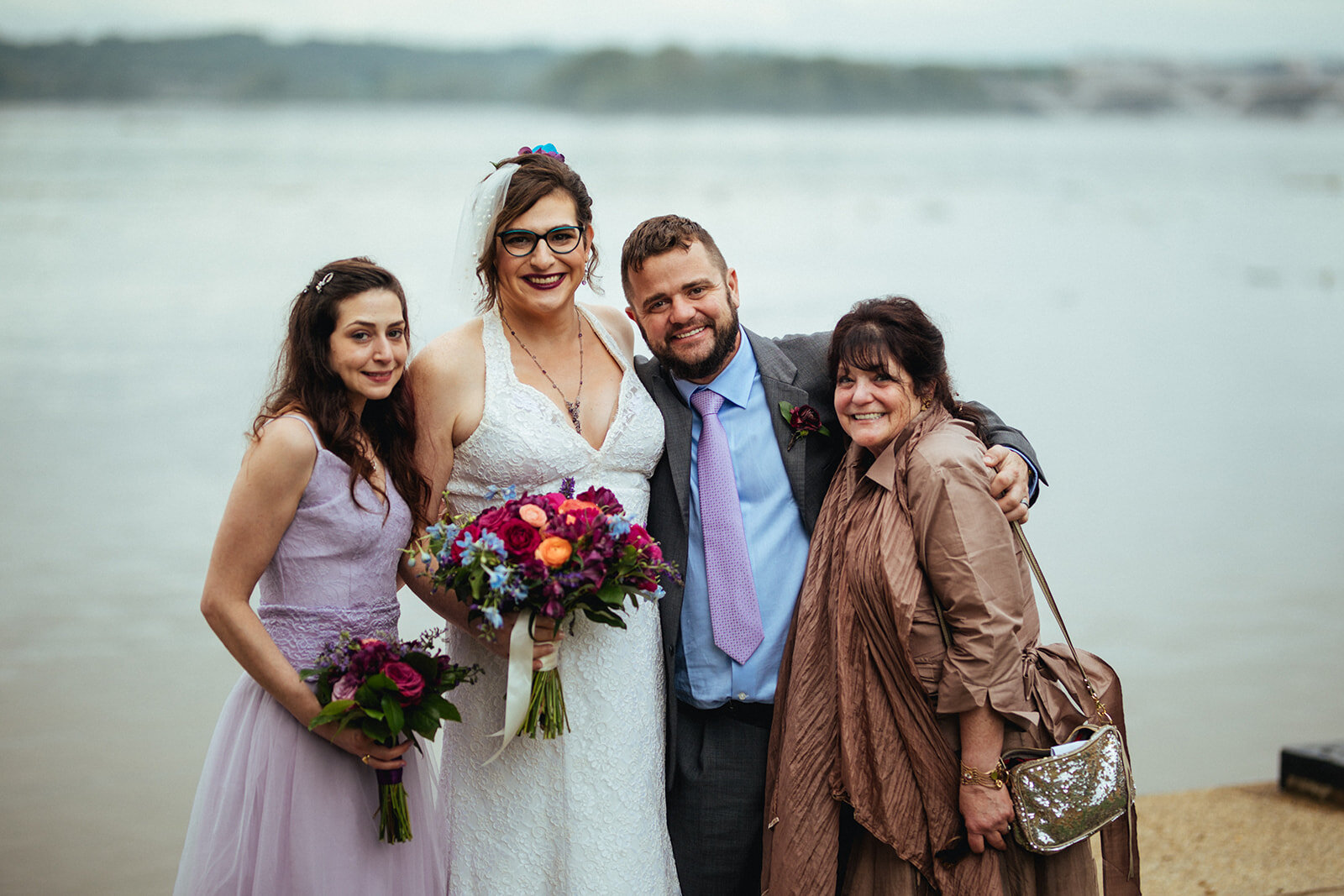 Newlywed lgbtq bride posing with family in Alexandria VA Shawnee Custalow Photographer