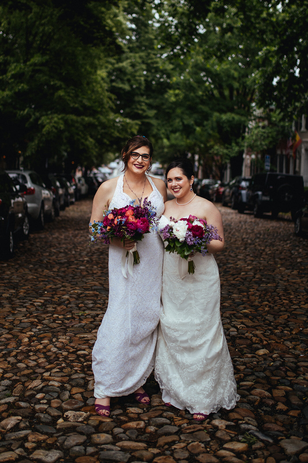 LGBTQ brides posing together in Alexandria VA Shawnee Custalow Wedding Photographer