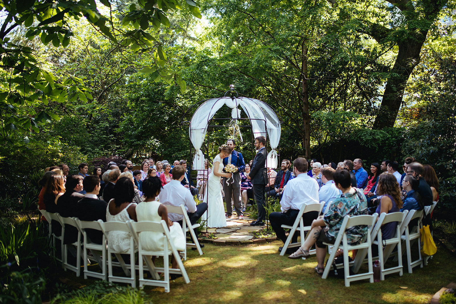 Circular backyard wedding ceremony in Atlanta GA Shawnee Custalow Queer Wedding Photographer