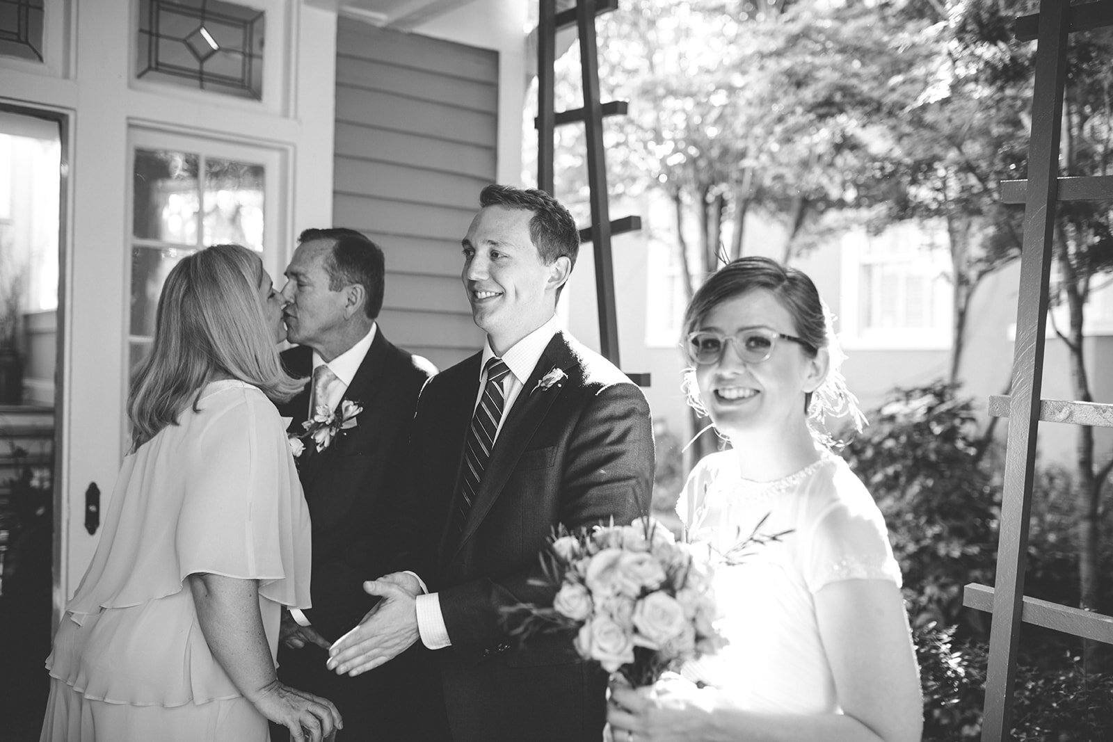 Candid family of the bride at home in Atlanta GA Shawnee Custalow Queer Wedding Photographer