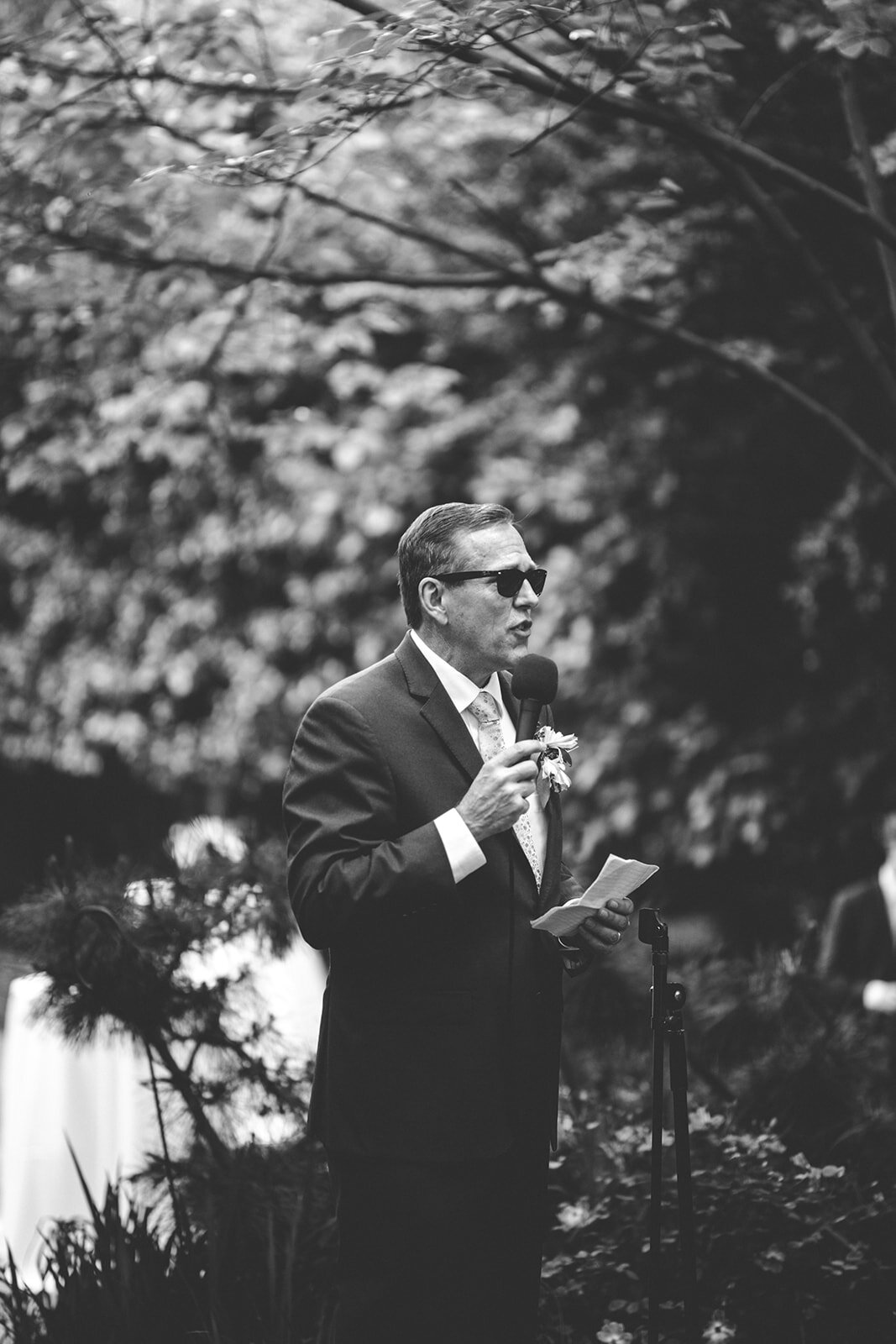 Man with sunglasses giving a speech in Atlanta GA wedding Shawnee Custalow Queer Photographer