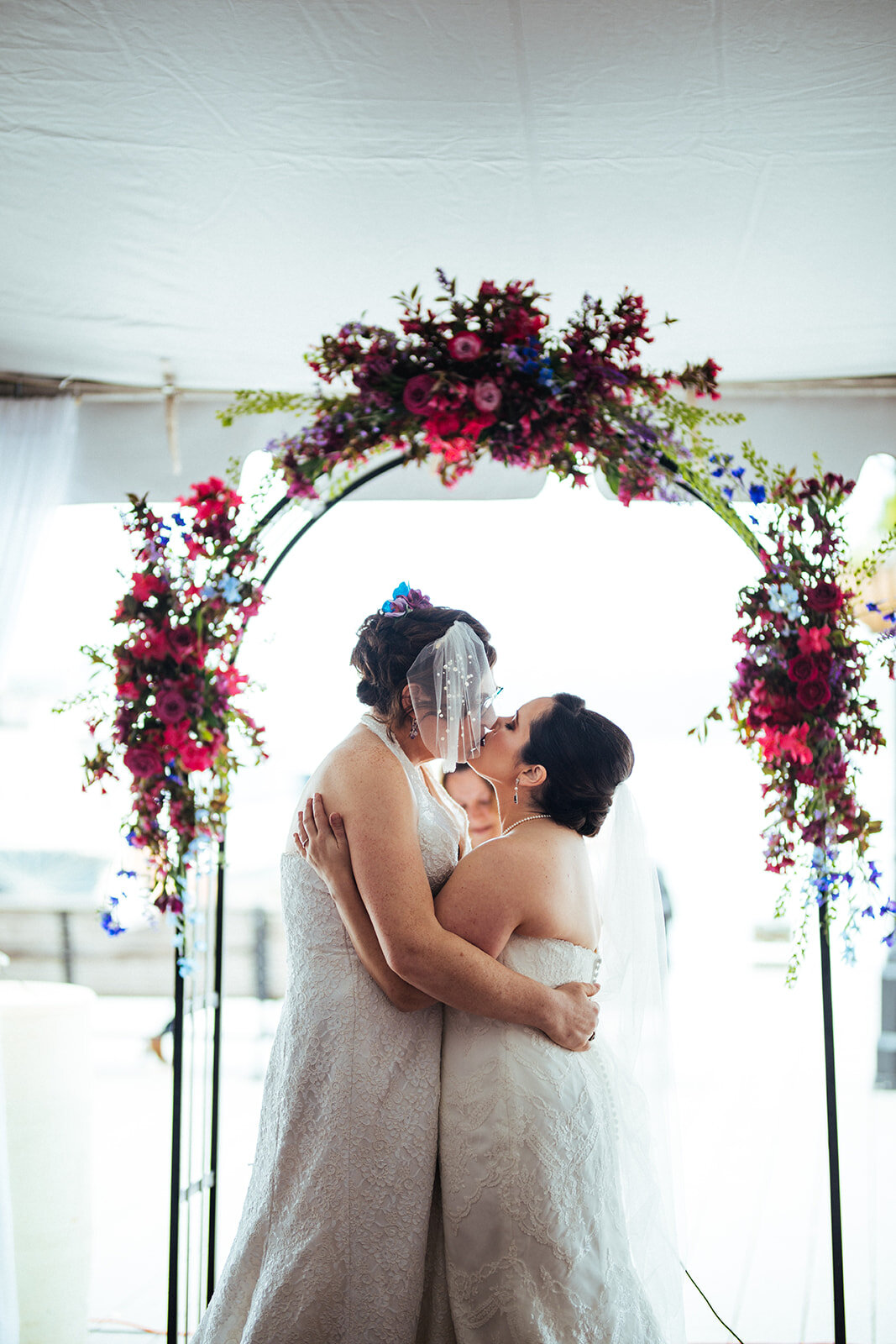 Newlywed brides kissing at Torpedo Factory ceremony Alexandria VA Newlywed brides kissing at Torpedo Factory ceremony Alexandria VA Shawnee Custalow