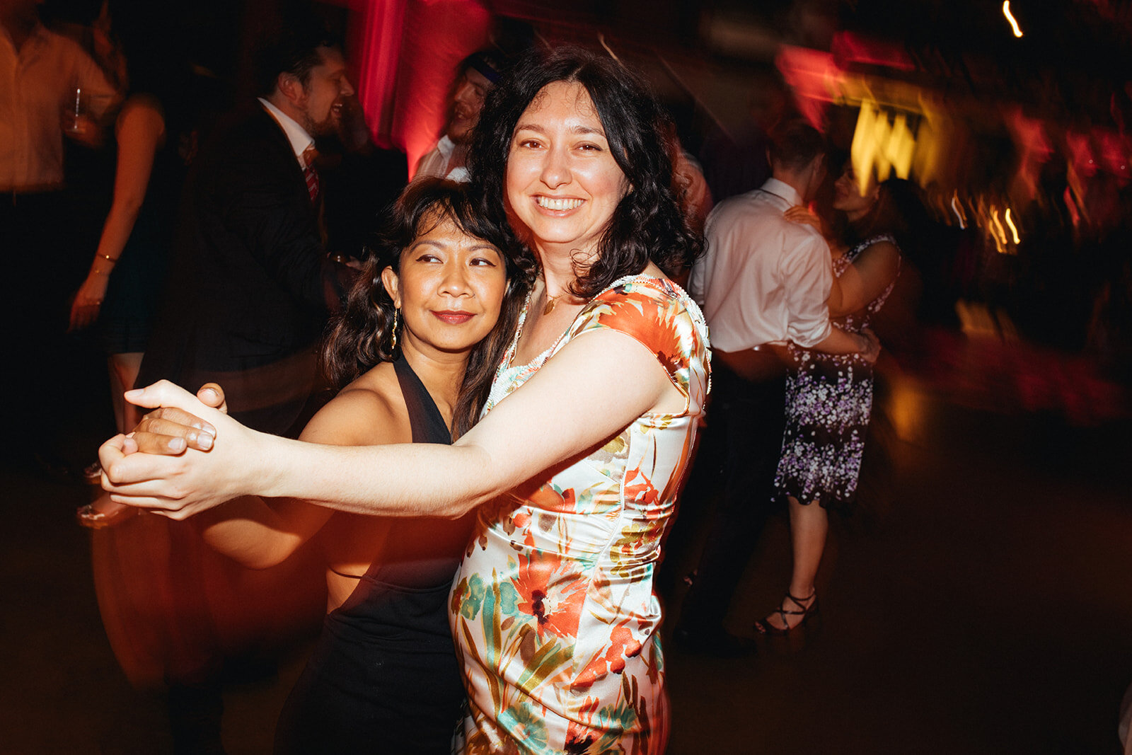 Wedding guests dancing at Torpedo Factory reception Alexandria VA Shawnee Custalow Queer Wedding Photography