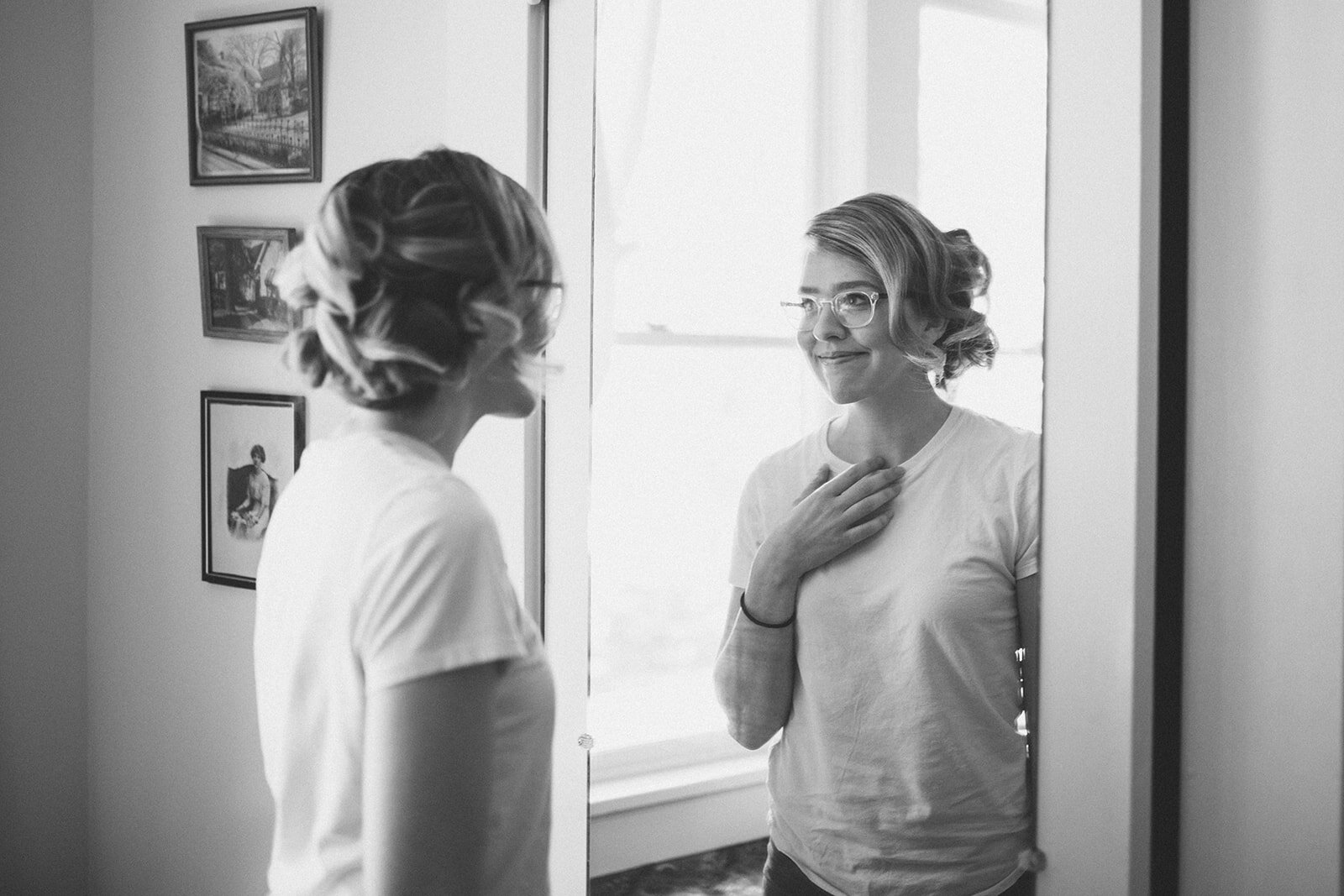 Bride to be looking in the mirror in Atlanta Georgia Shawnee Custalow Queer Wedding Photographer