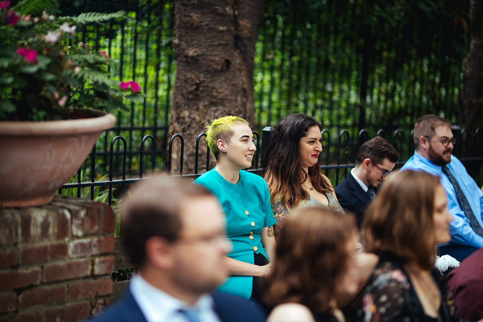 Guests watching a wedding ceremony in Philly PA Shawnee Custalow Queer Wedding Photography