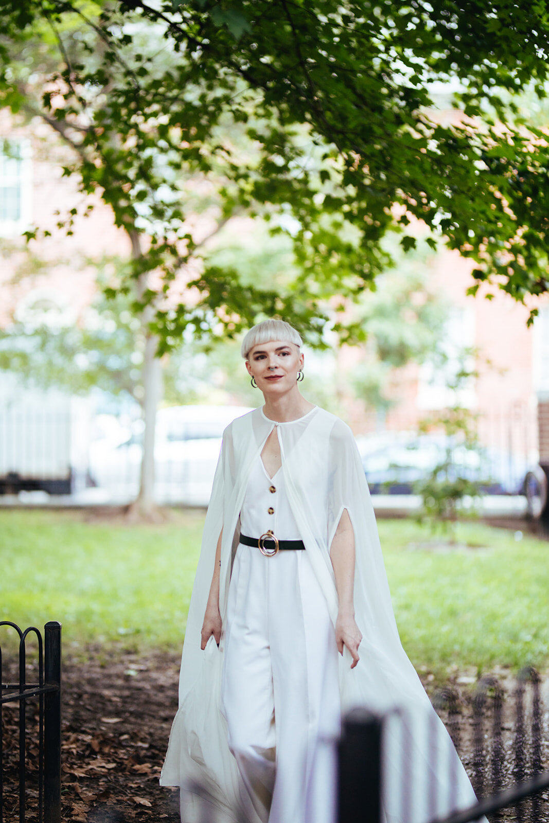 Future spouse walking down the aisle in Philadelphia PA Shawnee Custalow Queer Wedding Photography