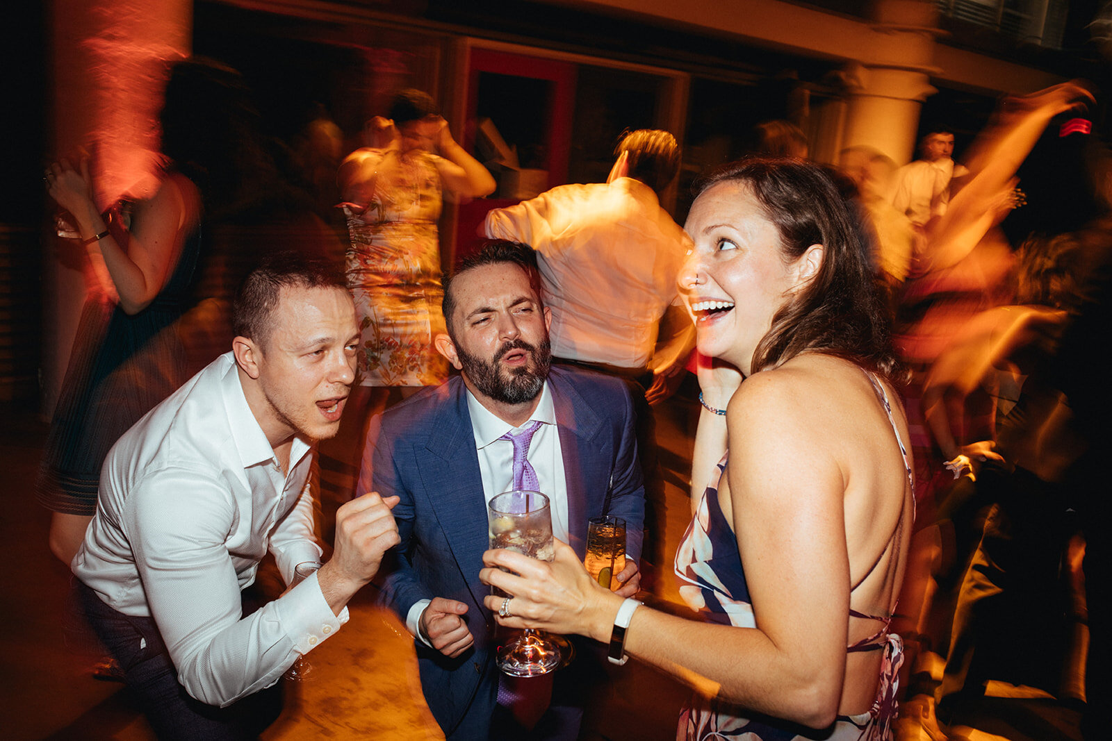 Wedding guests dancing at Torpedo Factory reception Alexandria VA Shawnee Custalow Queer Wedding Photography