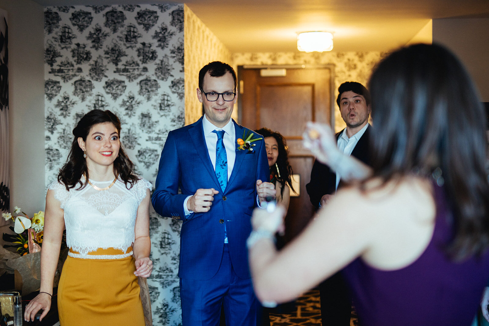 Bride and groom with guests before wedding in Brooklyn NYC Shawnee Custalow photography