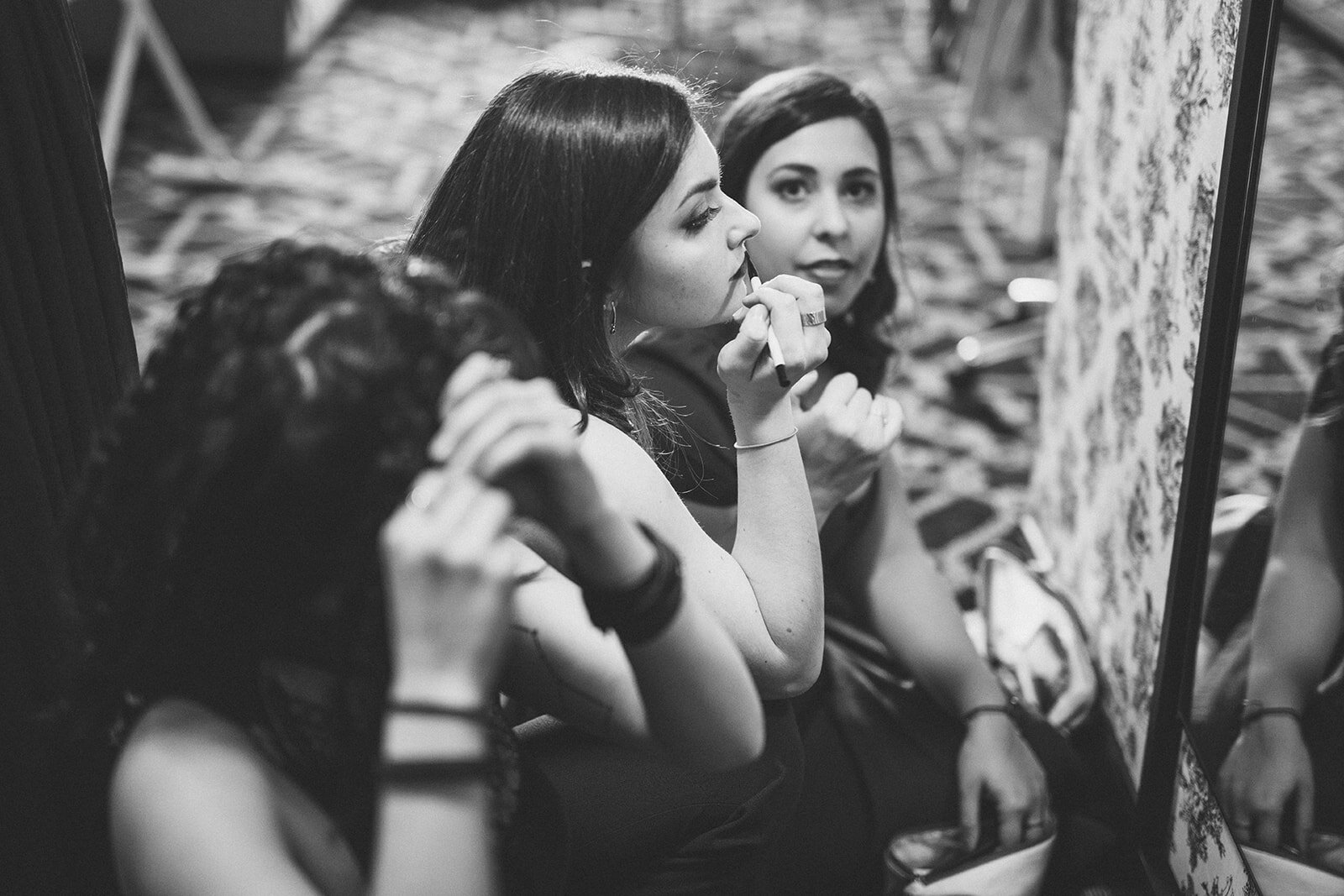 Bridesmaids doing their makeup in Brooklyn NY Shawnee Custalow wedding photography