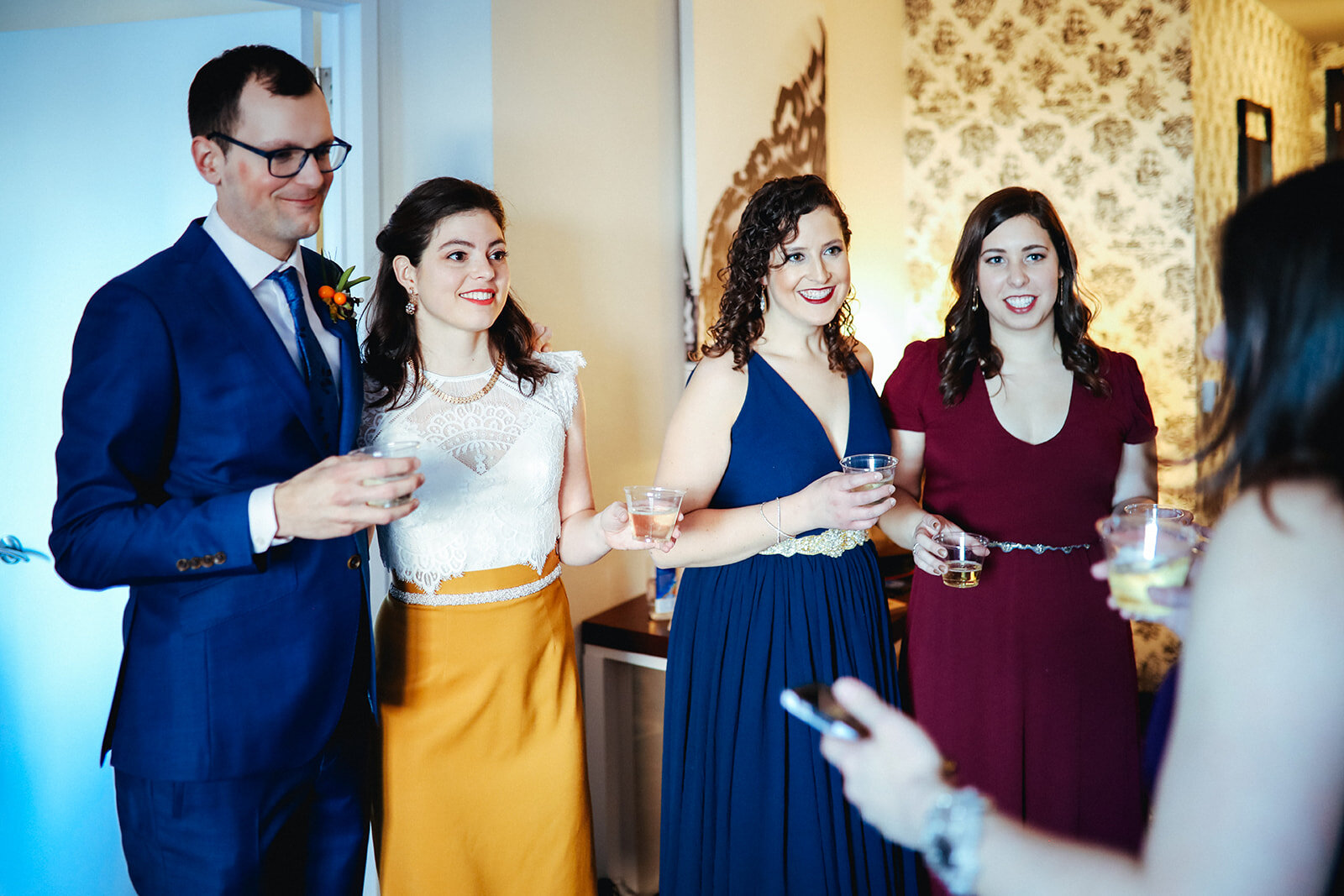 Future spouse drinking with wedding party before ceremony in Brooklyn Shawnee Custalow photography