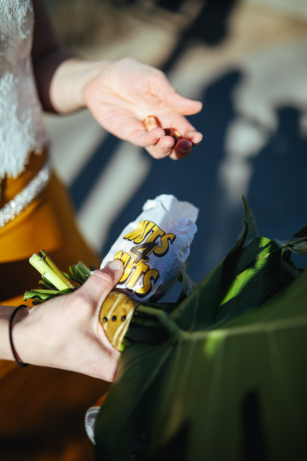 Bride holding Nuts 4 Nutes bag in New York City Shawnee Custalow wedding photography