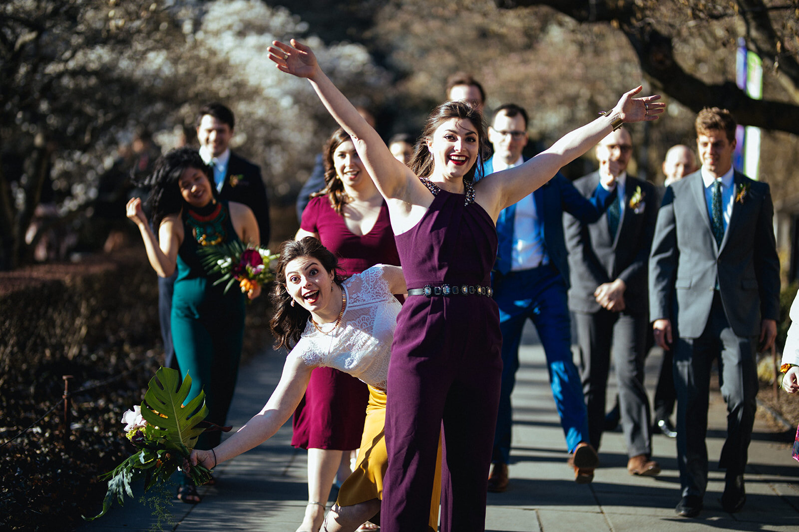 Bride and wedding party getting silly at the Brooklyn Botanical Gardens NY Shawnee Custalow