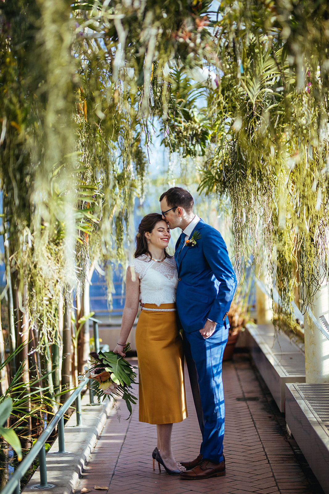 Groom kissing brides forehead at Brooklyn Botanical Garden NYC Shawnee Custalow wedding photography