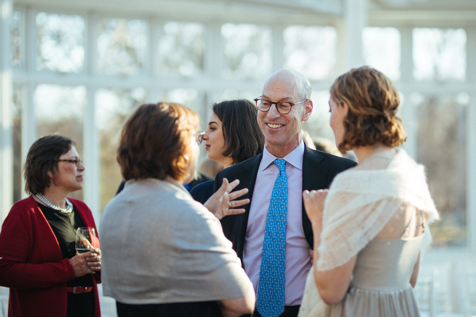 Wedding guests mingling at Brooklyn Botanical Garden NY Shawnee Custalow wedding photography