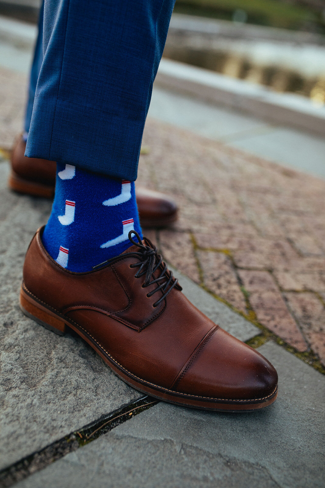 Grooms socks decorated with sock images in NYC Shawnee Custalow wedding photography