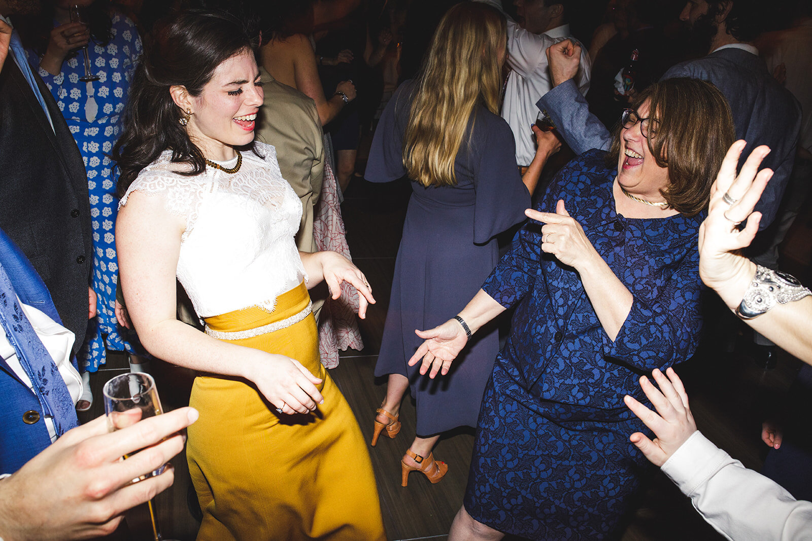 Newlywed and guests dancing at Brooklyn Botanical Garden NYC Shawnee Custalow wedding photography