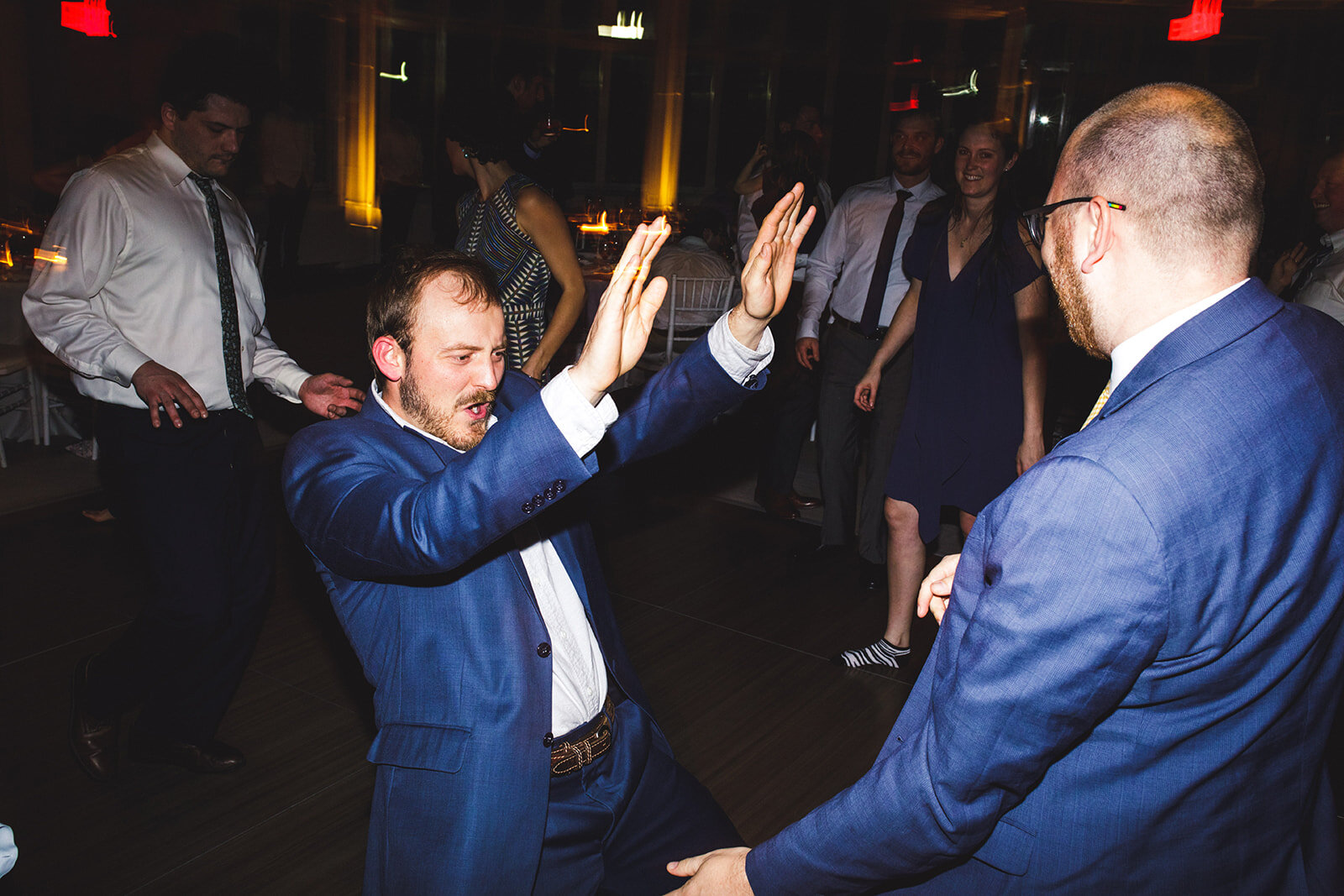 Wedding guests dancing at the Brooklyn Botanical Garden NYC Shawnee Custalow wedding photography