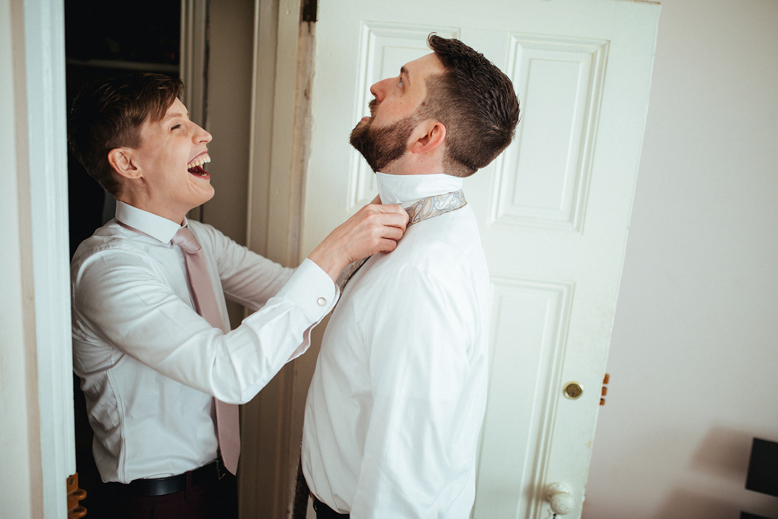 Future spouses helping tie their tie at the German Society of PA Shawnee Custalow LGBTQ wedding Photography