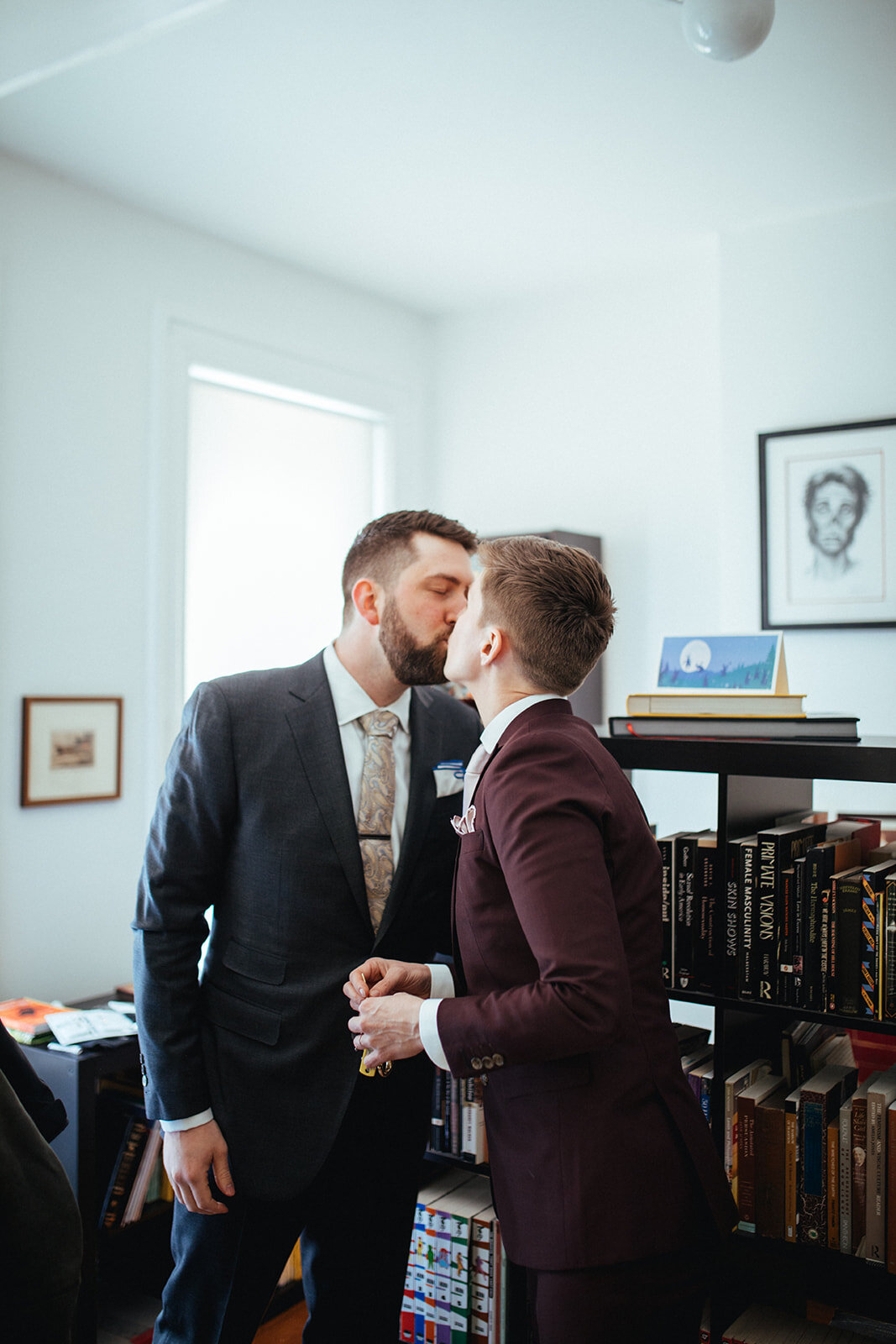 LGBTQ couple kissing before wedding at German Society of PA Shawnee Custalow LGBTQ wedding Photography
