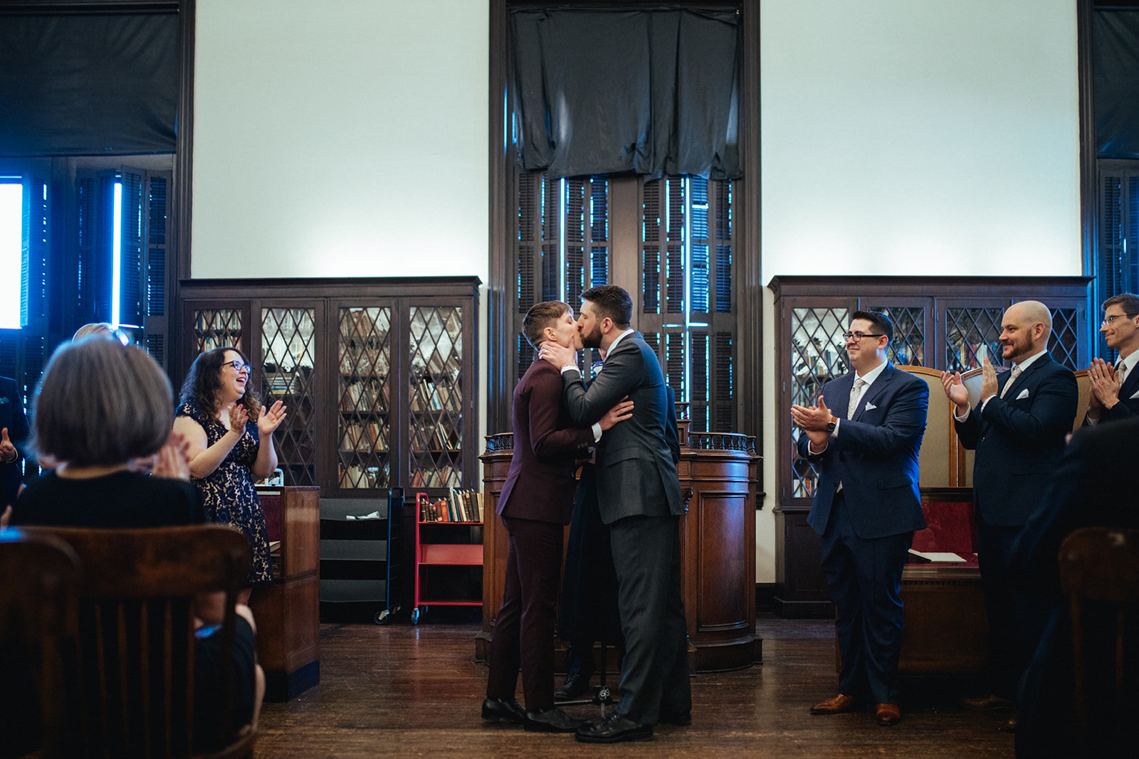 Newly married LGBTQ couple kissing at German Society of PA Shawnee Custalow wedding Photography