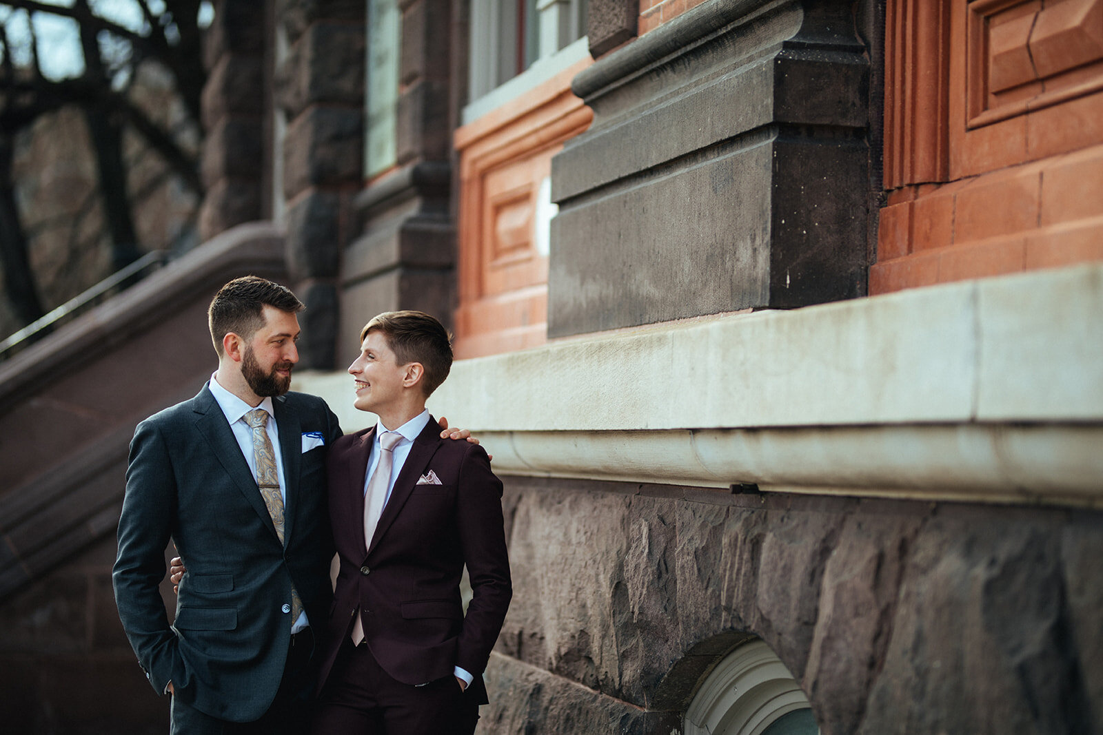 Newly married queer couple outside German Society of PA Shawnee Custalow wedding Photography