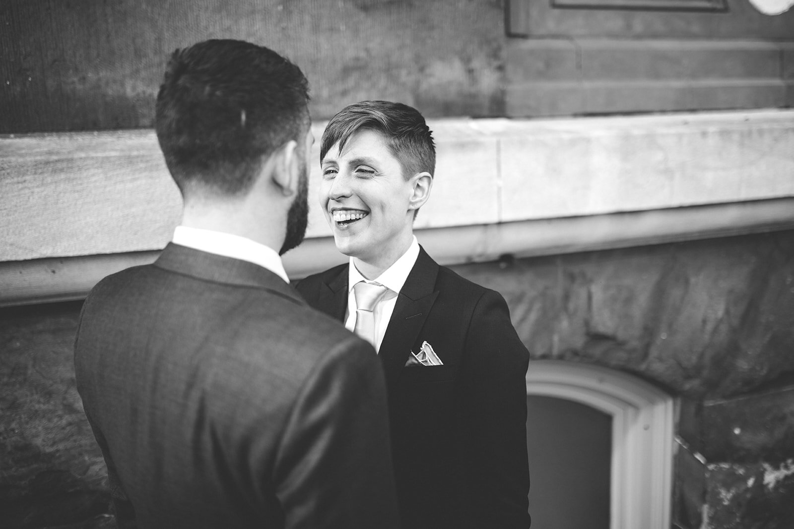 Happy newlyweds together outside German Society of PA Shawnee Custalow LGBTQ wedding Photography