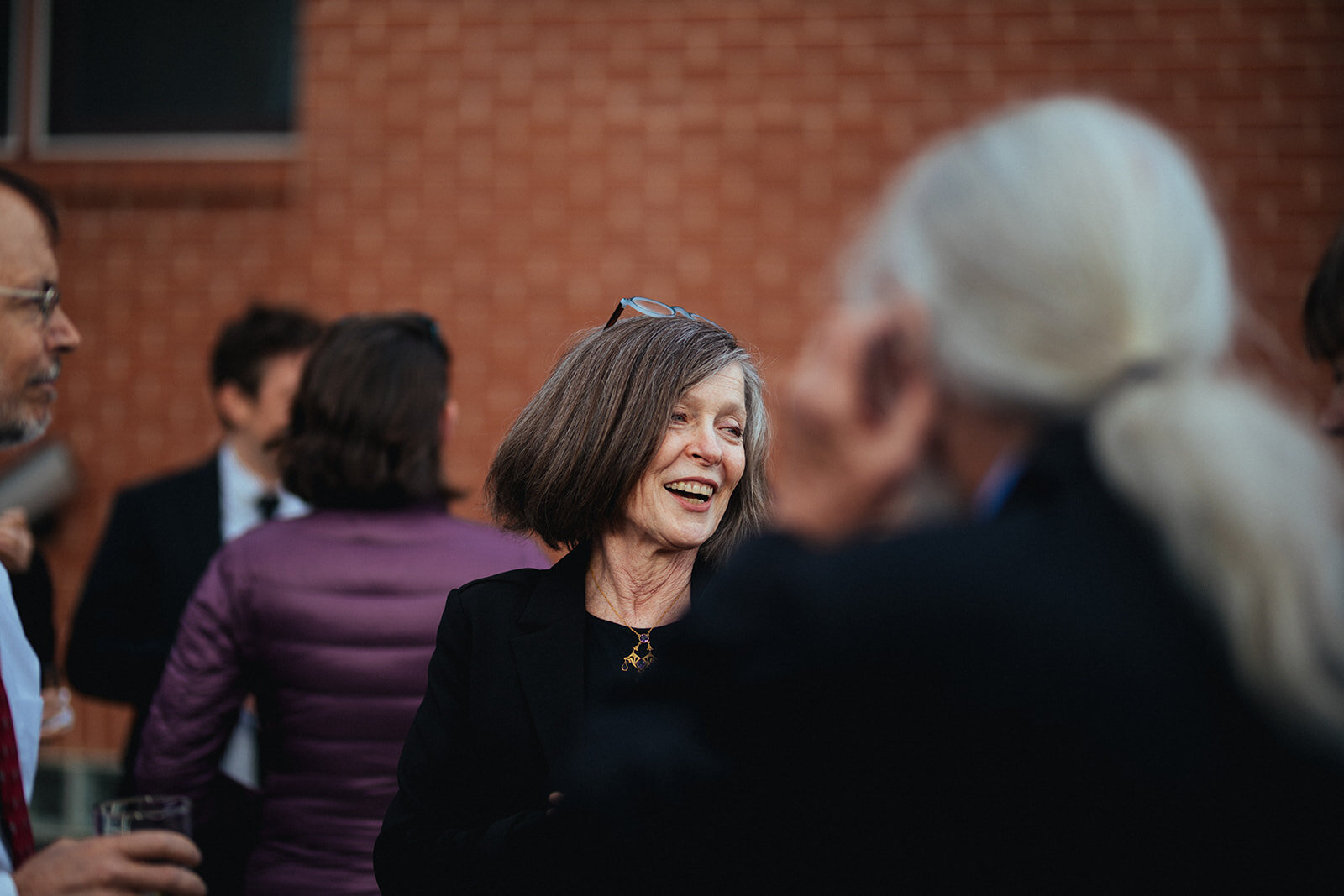 Happy wedding guest at German Society of PA Shawnee Custalow LGBTQ wedding Photography