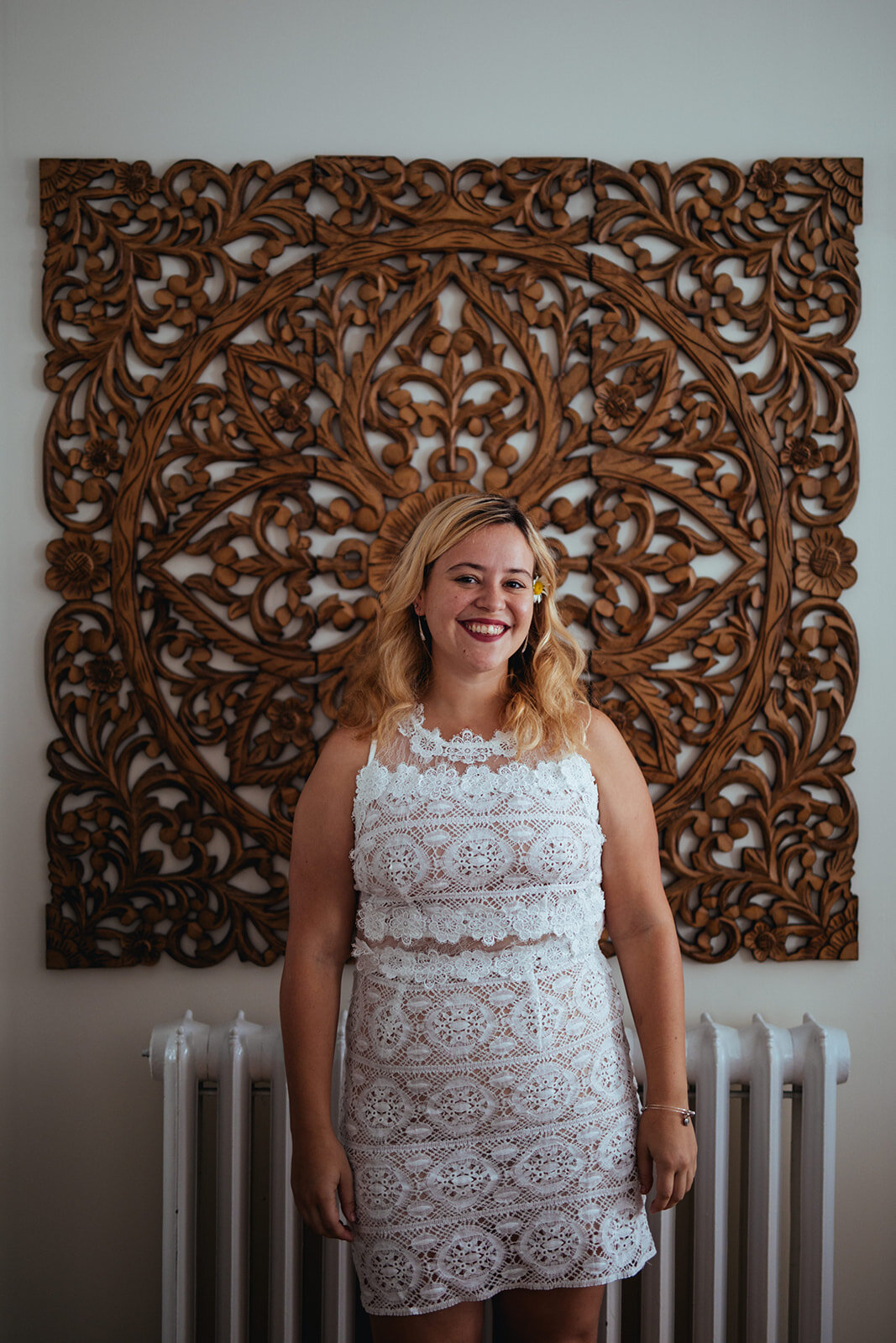 Honor attendant in a white lace dress in Portland ME Shawnee Custalow Queer wedding photography