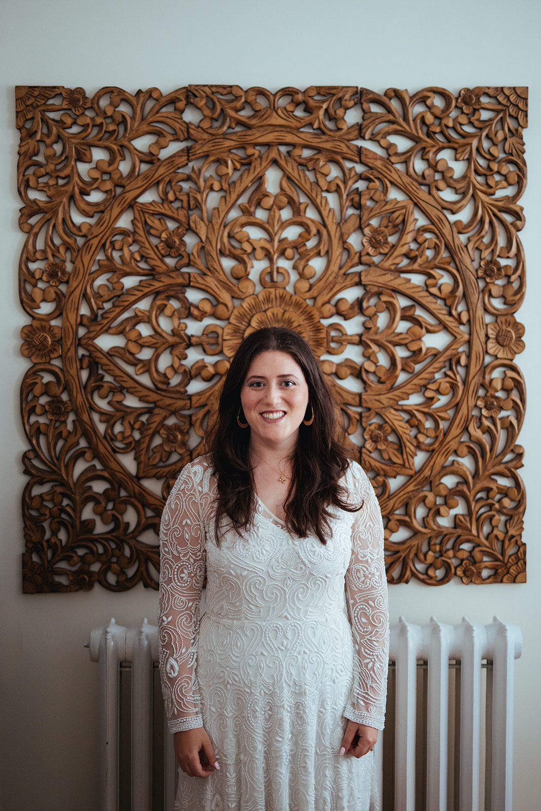 Honor attendant in a white dress in Portland ME Shawnee Custalow Queer wedding photography