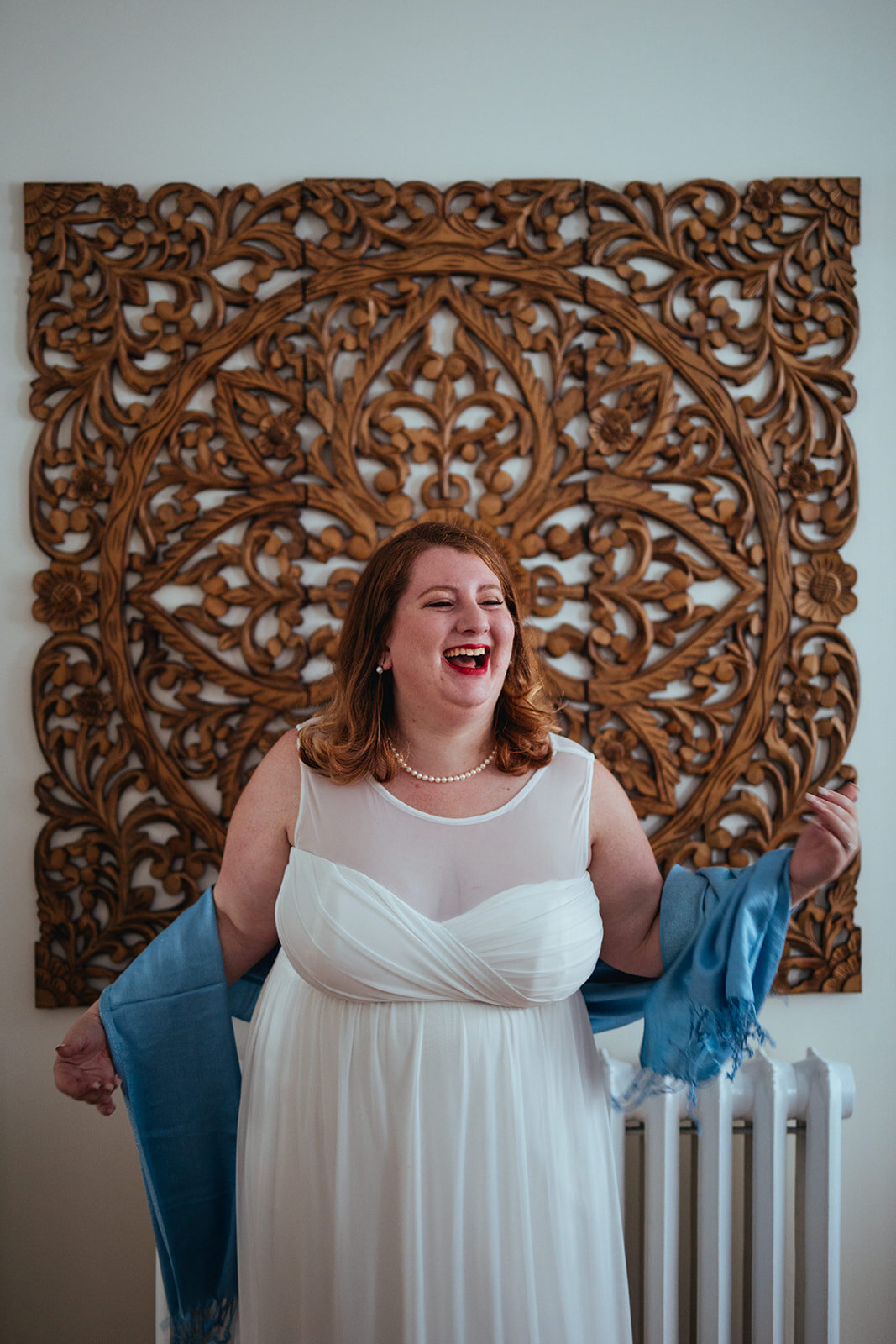 Honor attendant in white dress in Portland ME Shawnee Custalow Queer wedding photography