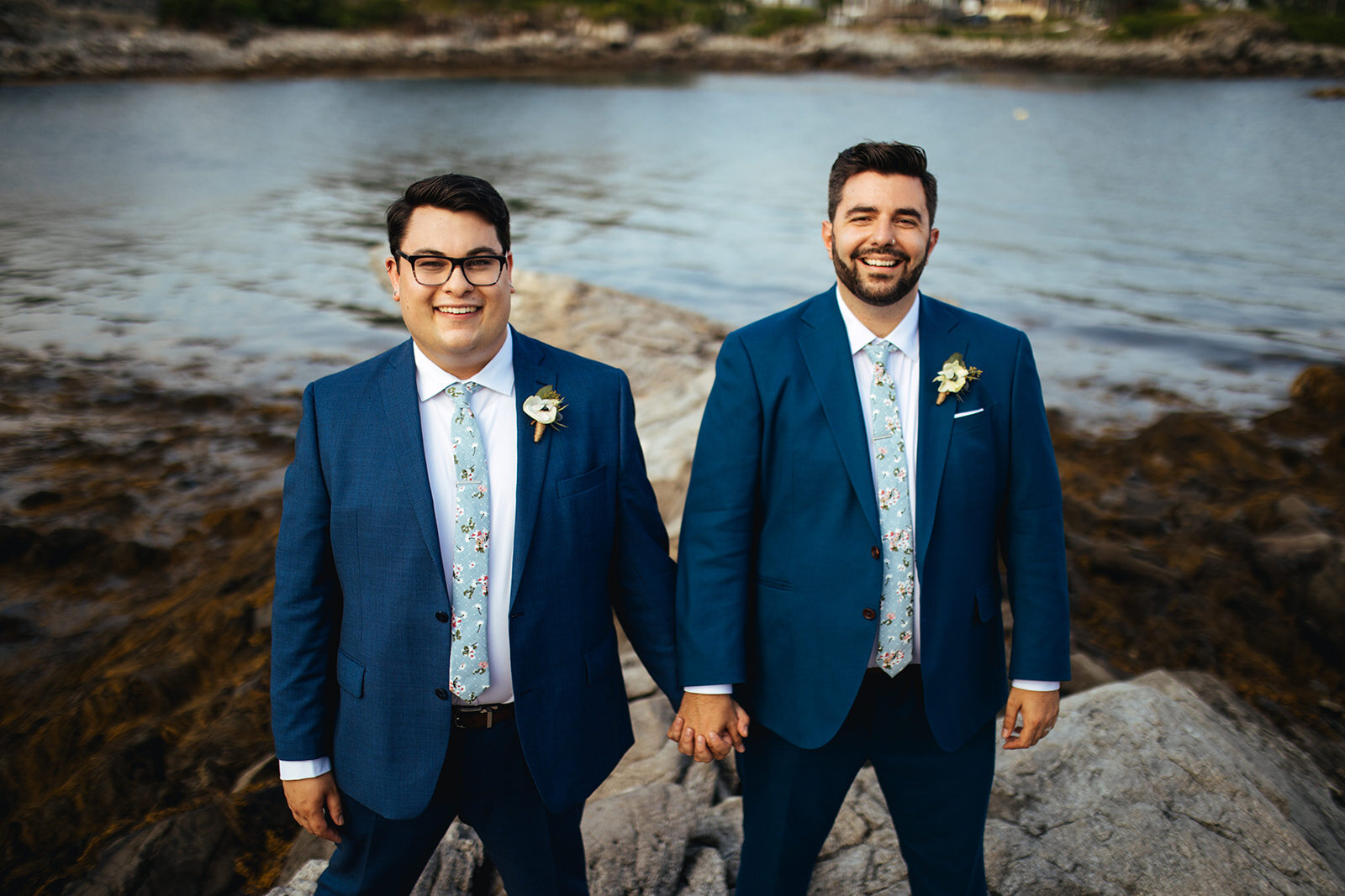 LGBTQ couple to be wed holding hands on Peaks Island Portland ME Shawnee Custalow wedding photography