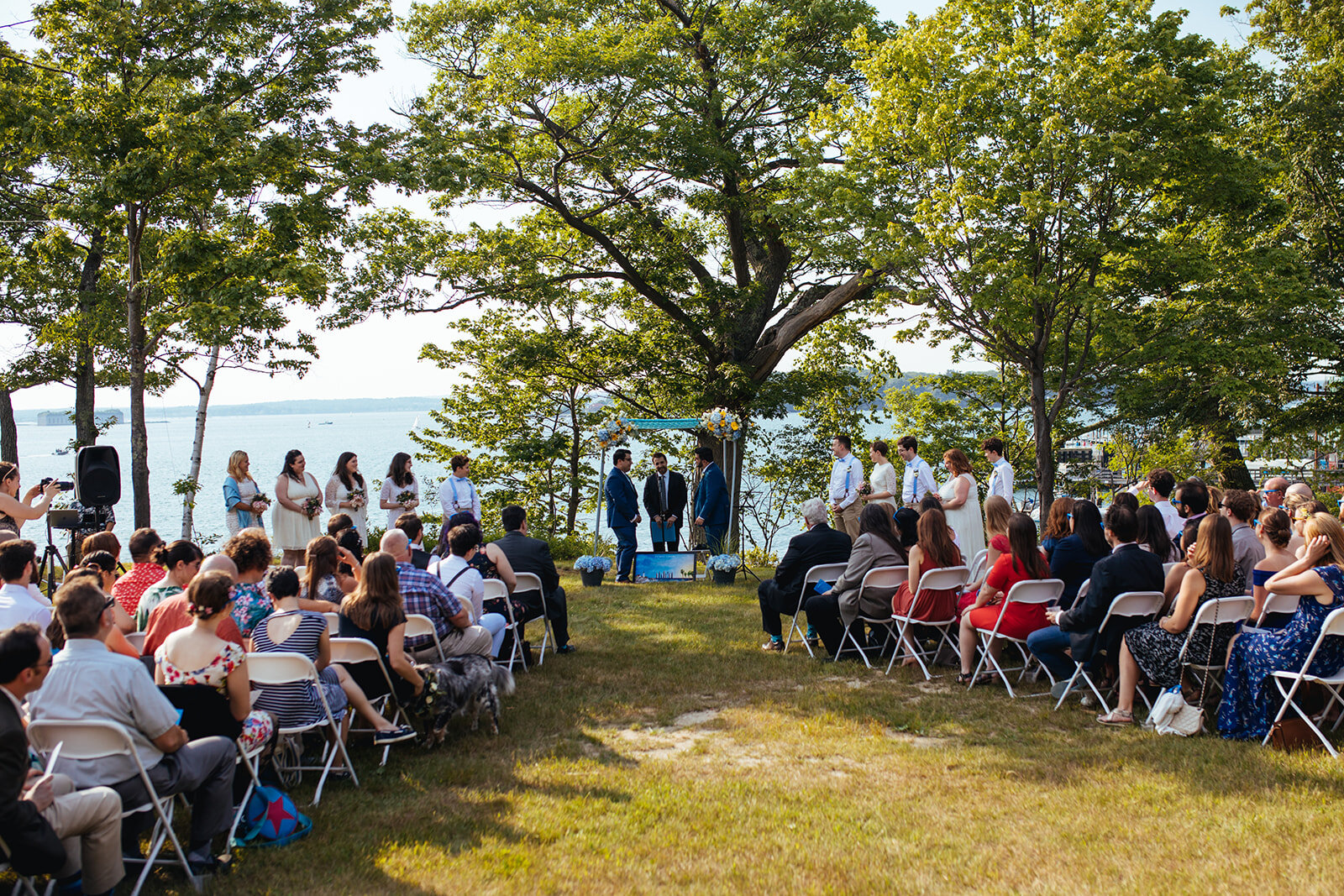 Wedding ceremony on Peaks Island Portland ME Shawnee Custalow Queer wedding photography