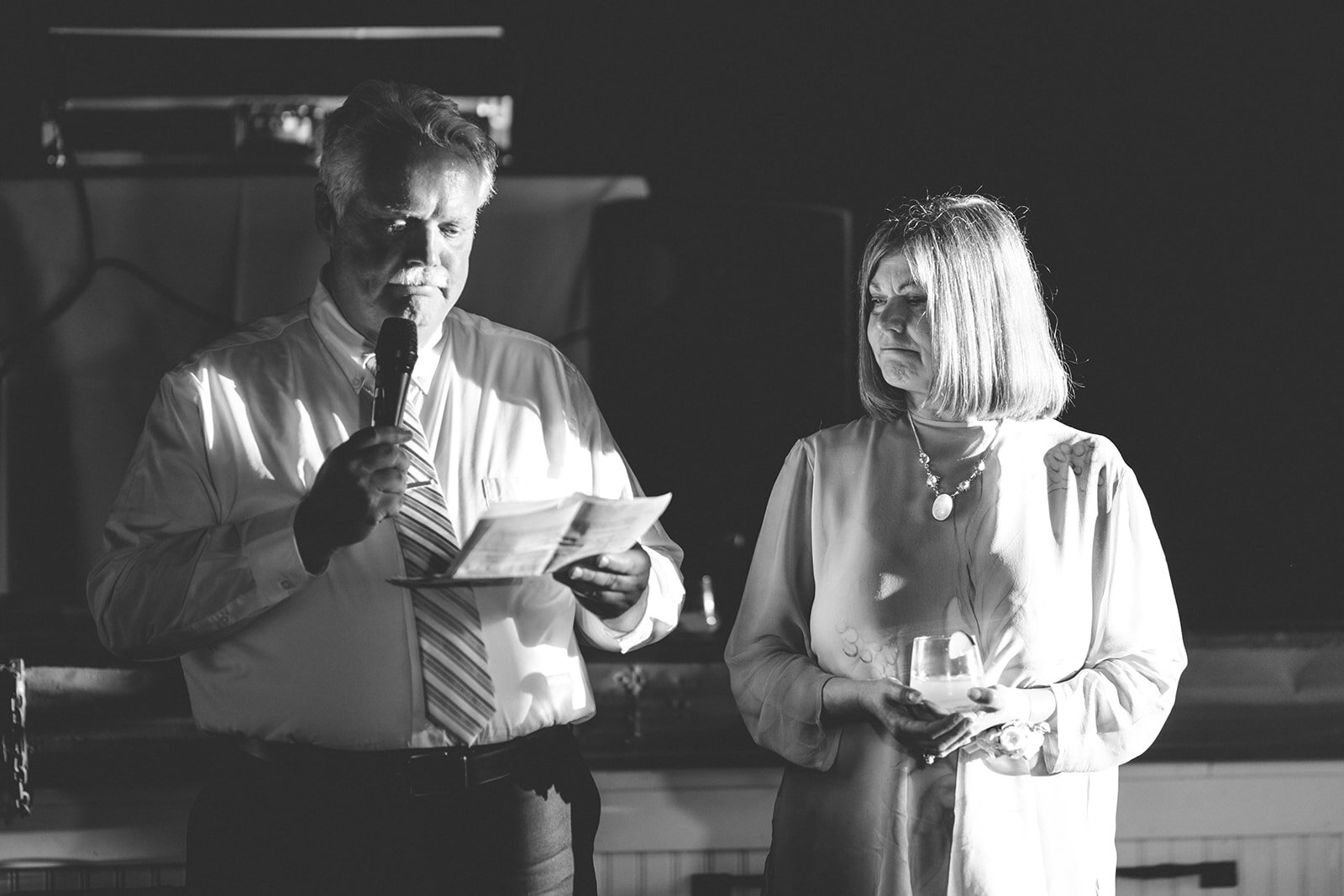 Relatives giving a wedding reception speech in Portland ME Shawnee Custalow Queer wedding photography