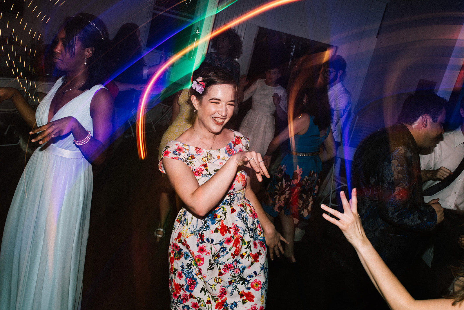 Wedding guests dancing in Portland ME Shawnee Custalow Queer wedding photography