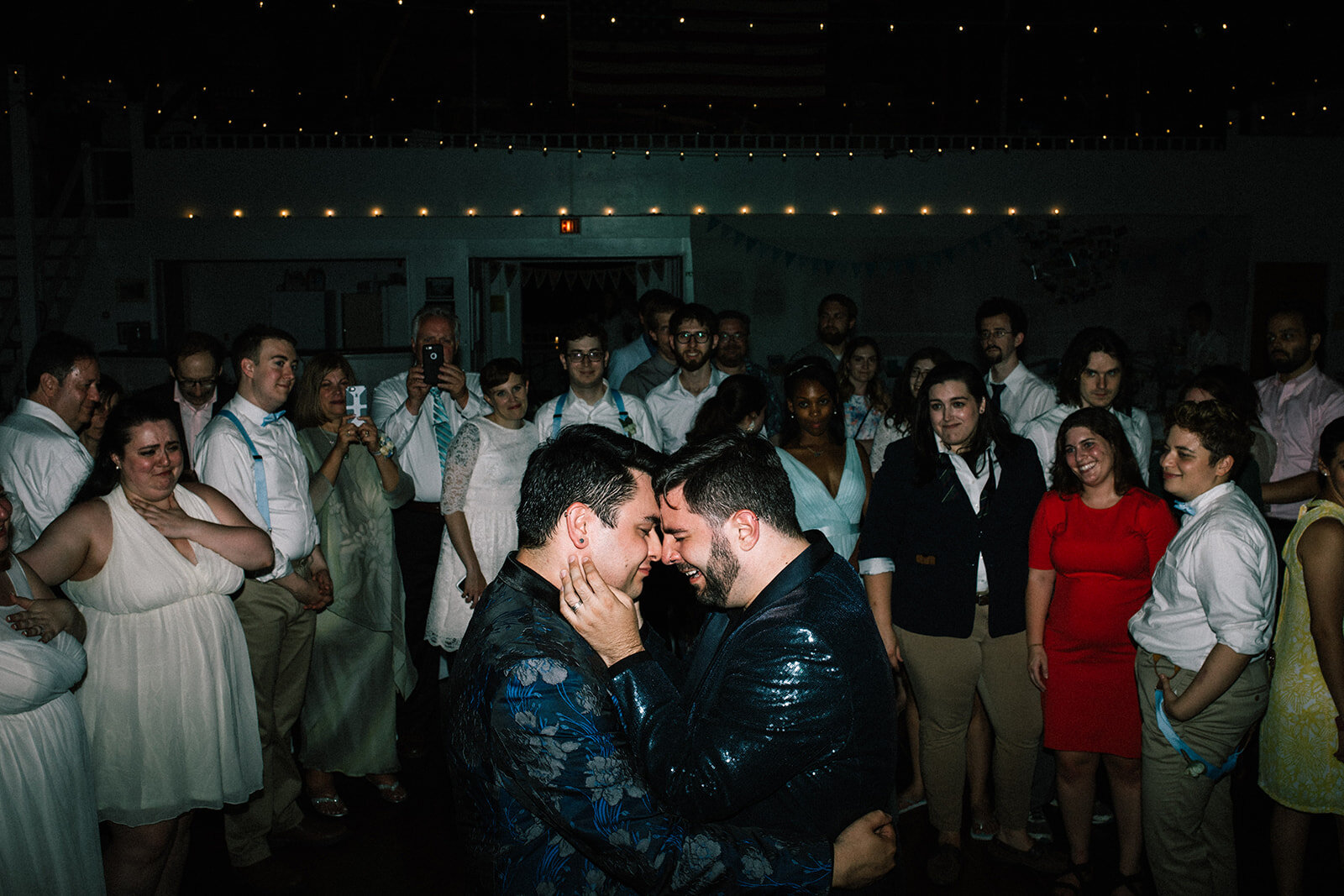 LGBTQ newlyweds dancing in Portland ME Shawnee Custalow Queer wedding photography