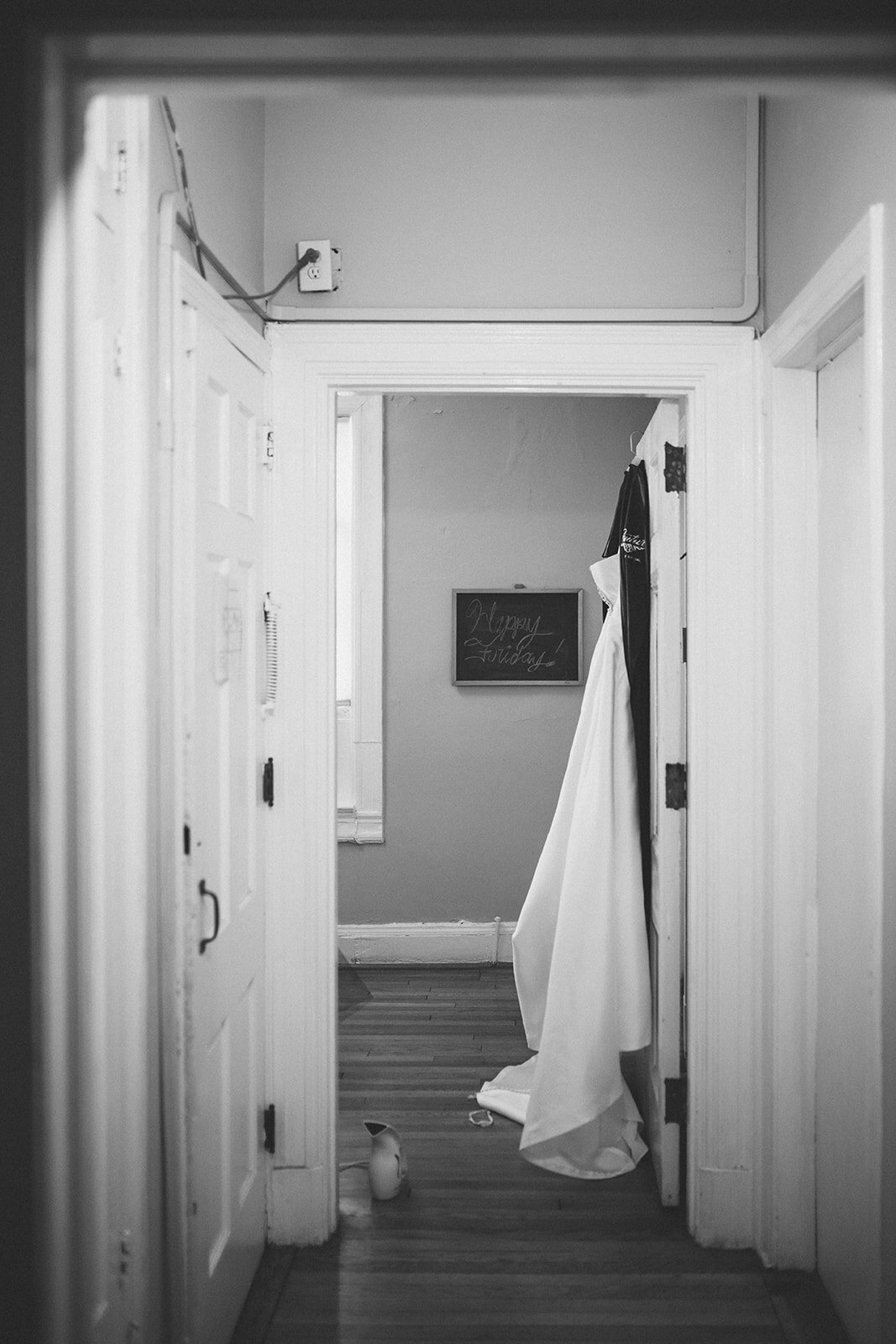 Wedding dress hanging in Washington DC Shawnee Custalow photography